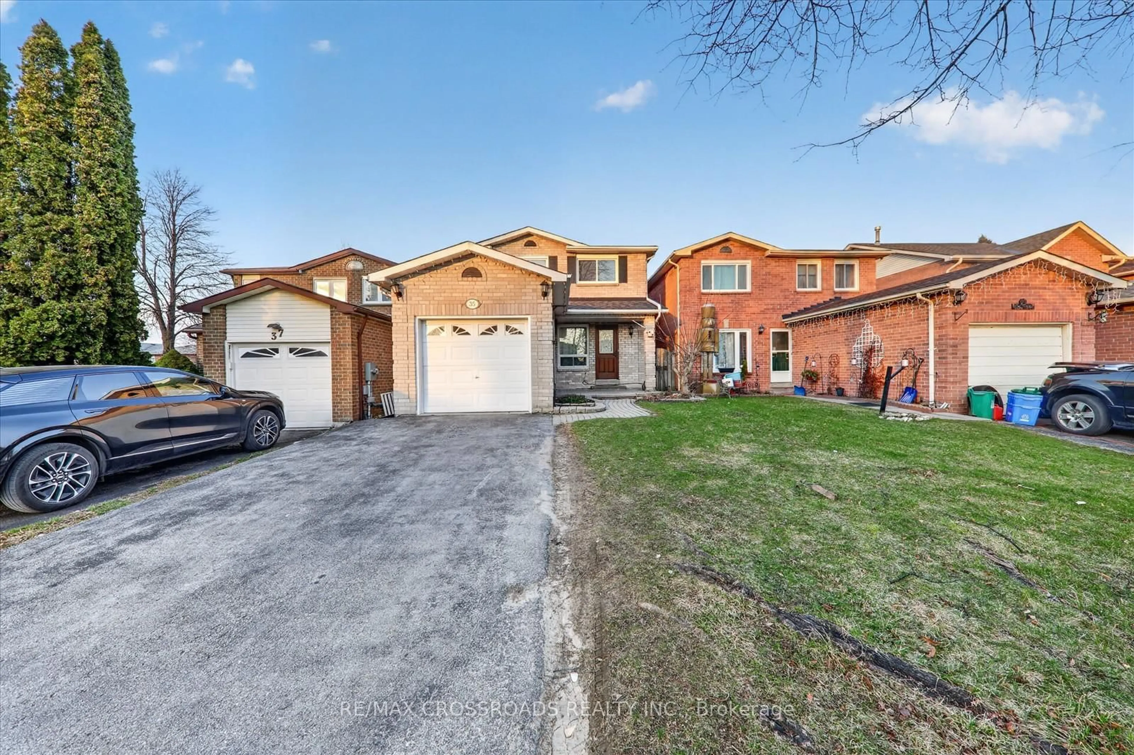 Home with brick exterior material, street for 35 Harley Dr, Ajax Ontario L1S 5X6