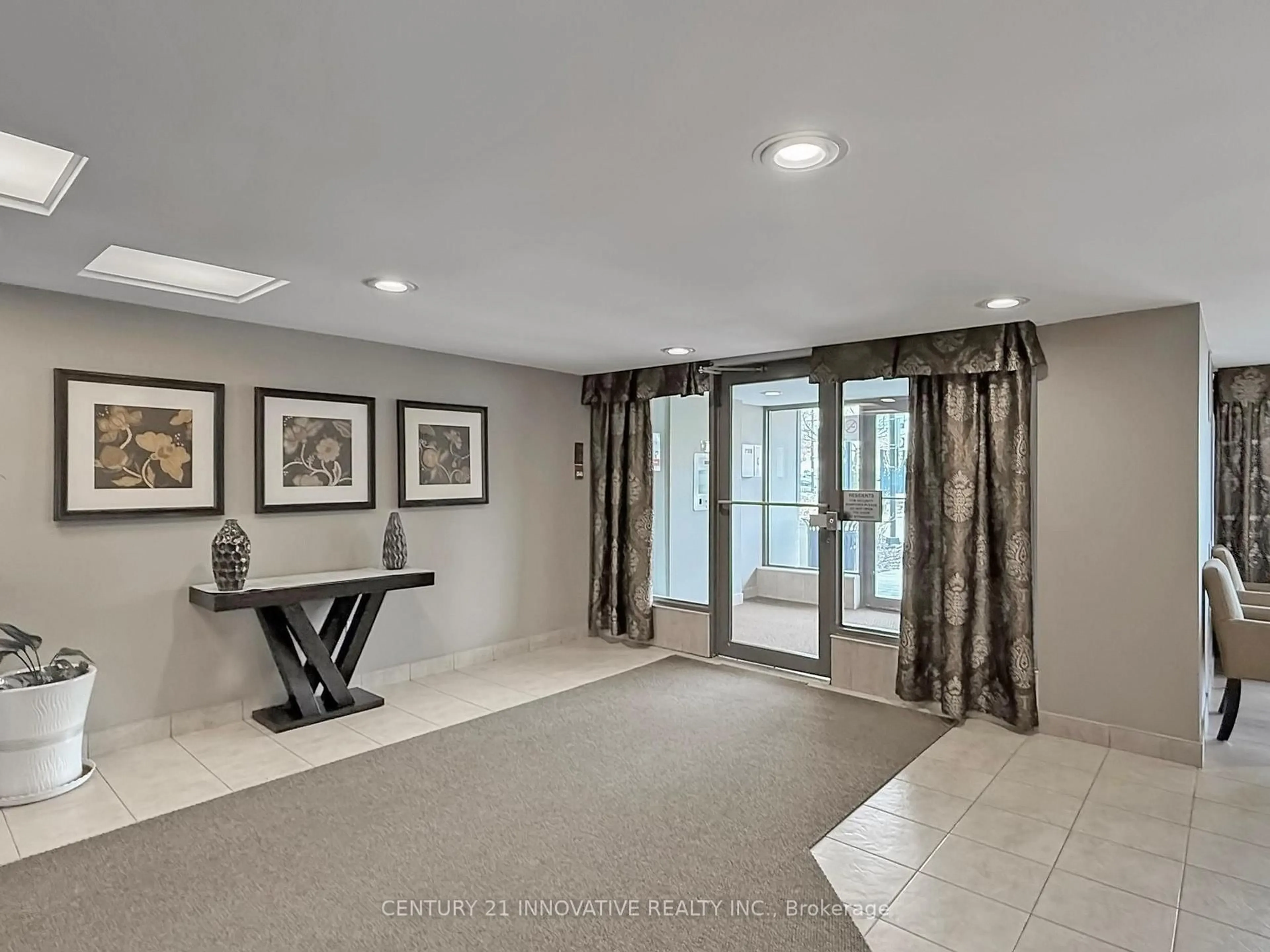 Indoor entryway for 3131 Bridletowne Circ #1702, Toronto Ontario M1W 2S9