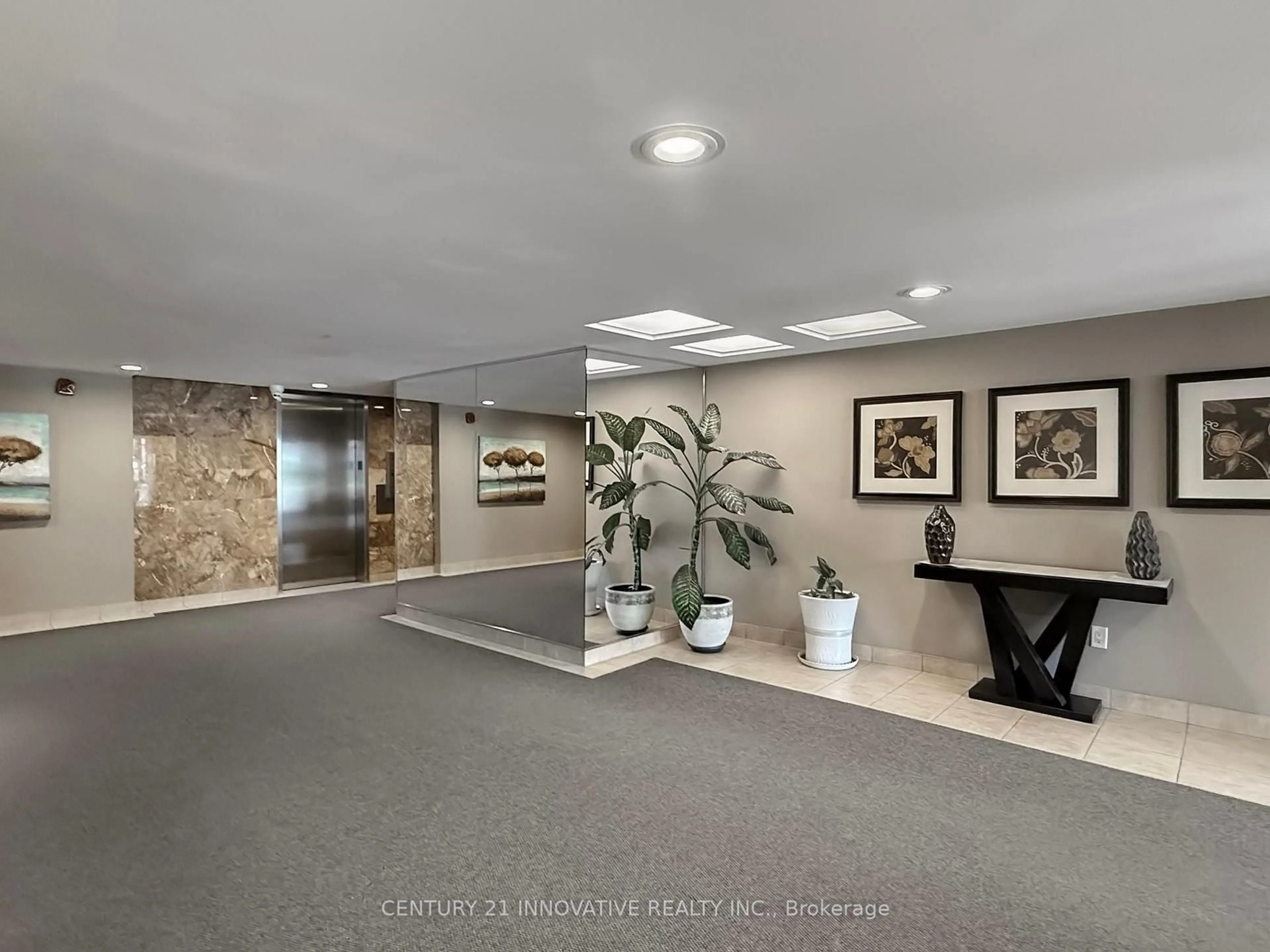 Indoor foyer for 3131 Bridletowne Circ #1702, Toronto Ontario M1W 2S9
