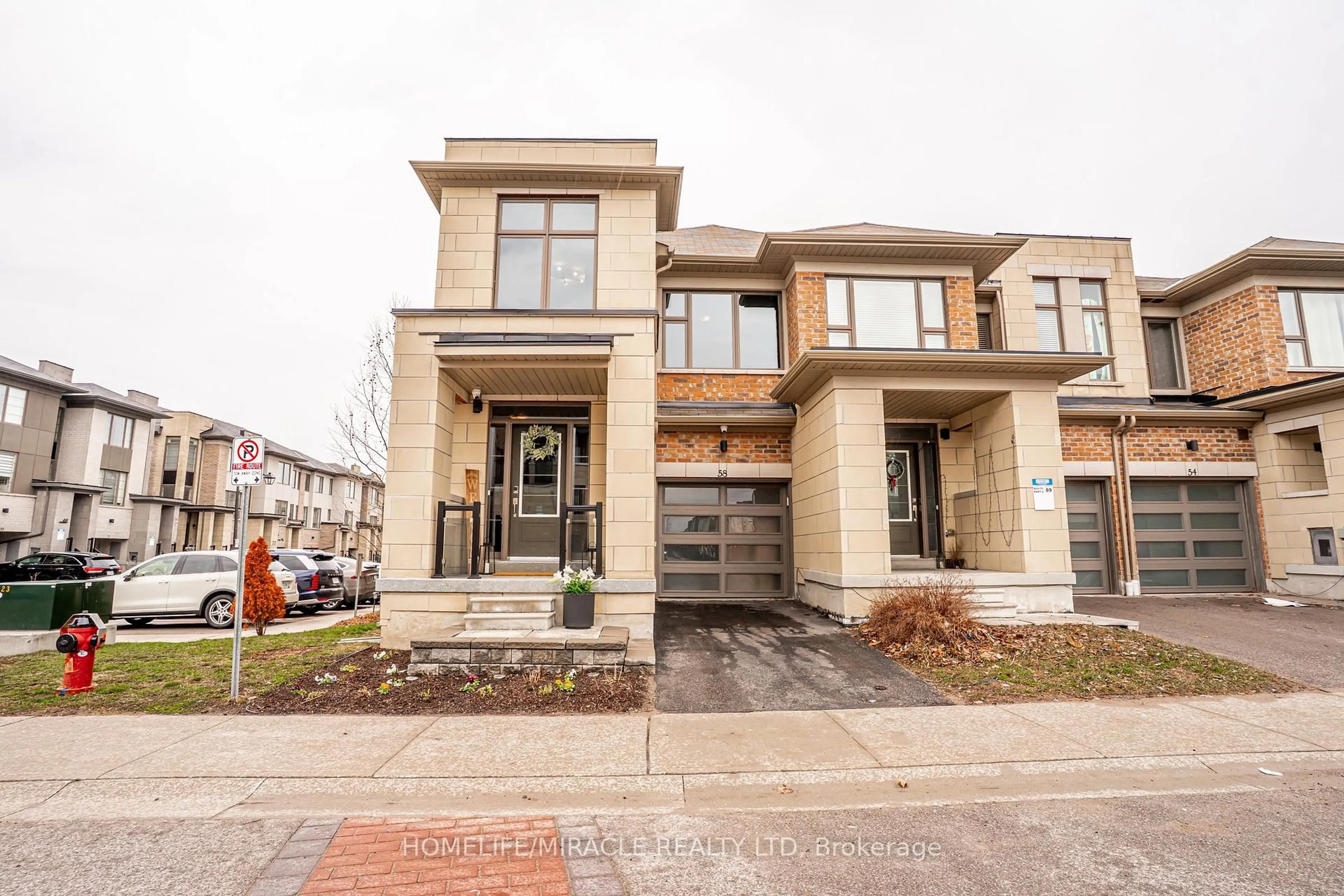 Home with brick exterior material, street for 58 Donald Fleming Way #136, Whitby Ontario L1R 0N8