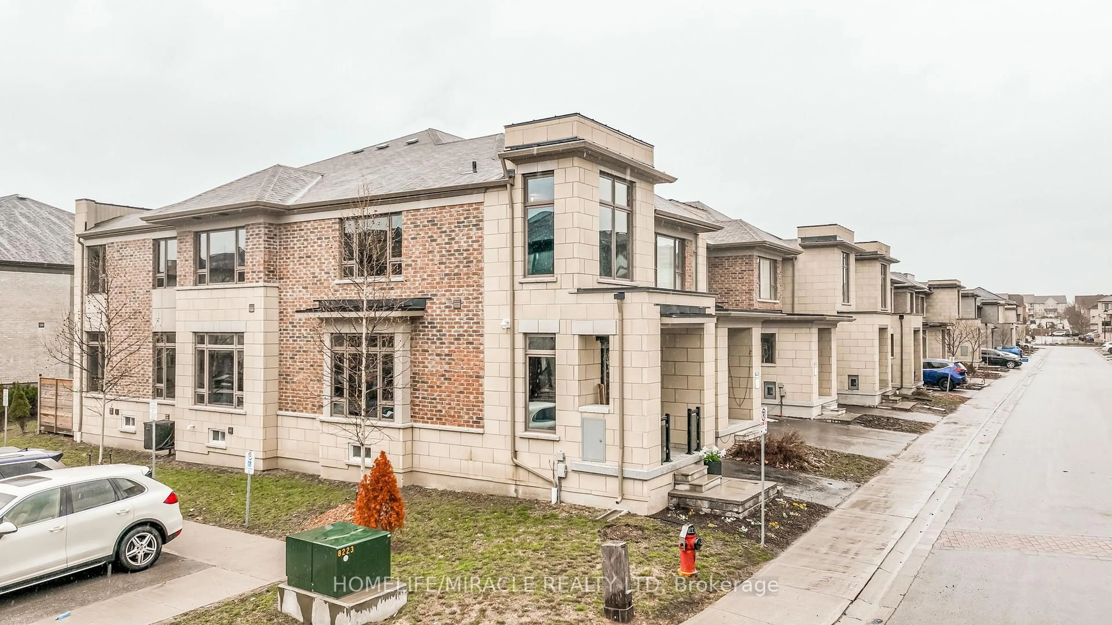 Home with brick exterior material, building for 58 Donald Fleming Way #136, Whitby Ontario L1R 0N8