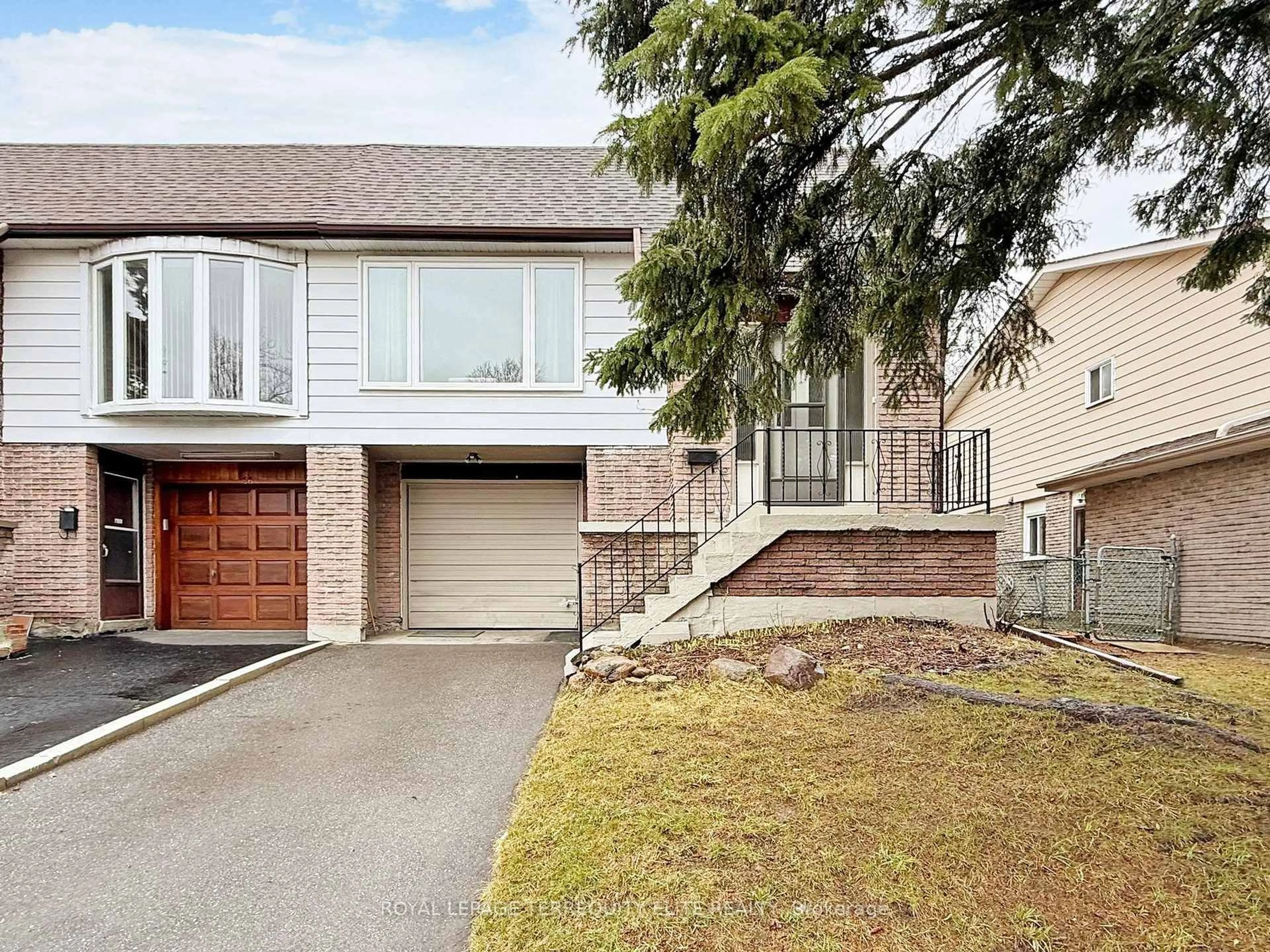 Home with brick exterior material, street for 68 Ashridge Dr, Toronto Ontario M1V 1P2