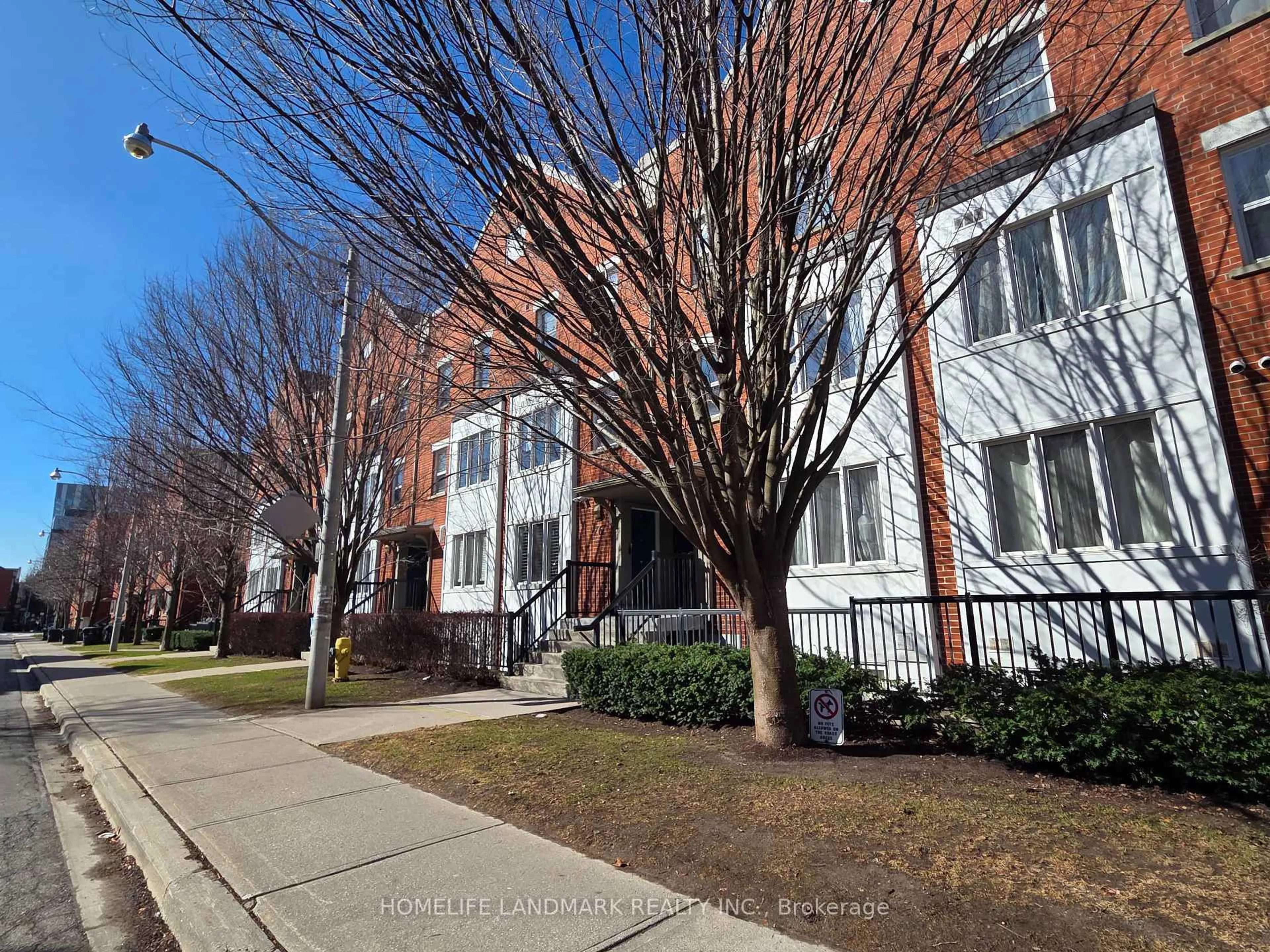 A pic from outside/outdoor area/front of a property/back of a property/a pic from drone, street for 74 Munro St #2, Toronto Ontario M4M 2S9