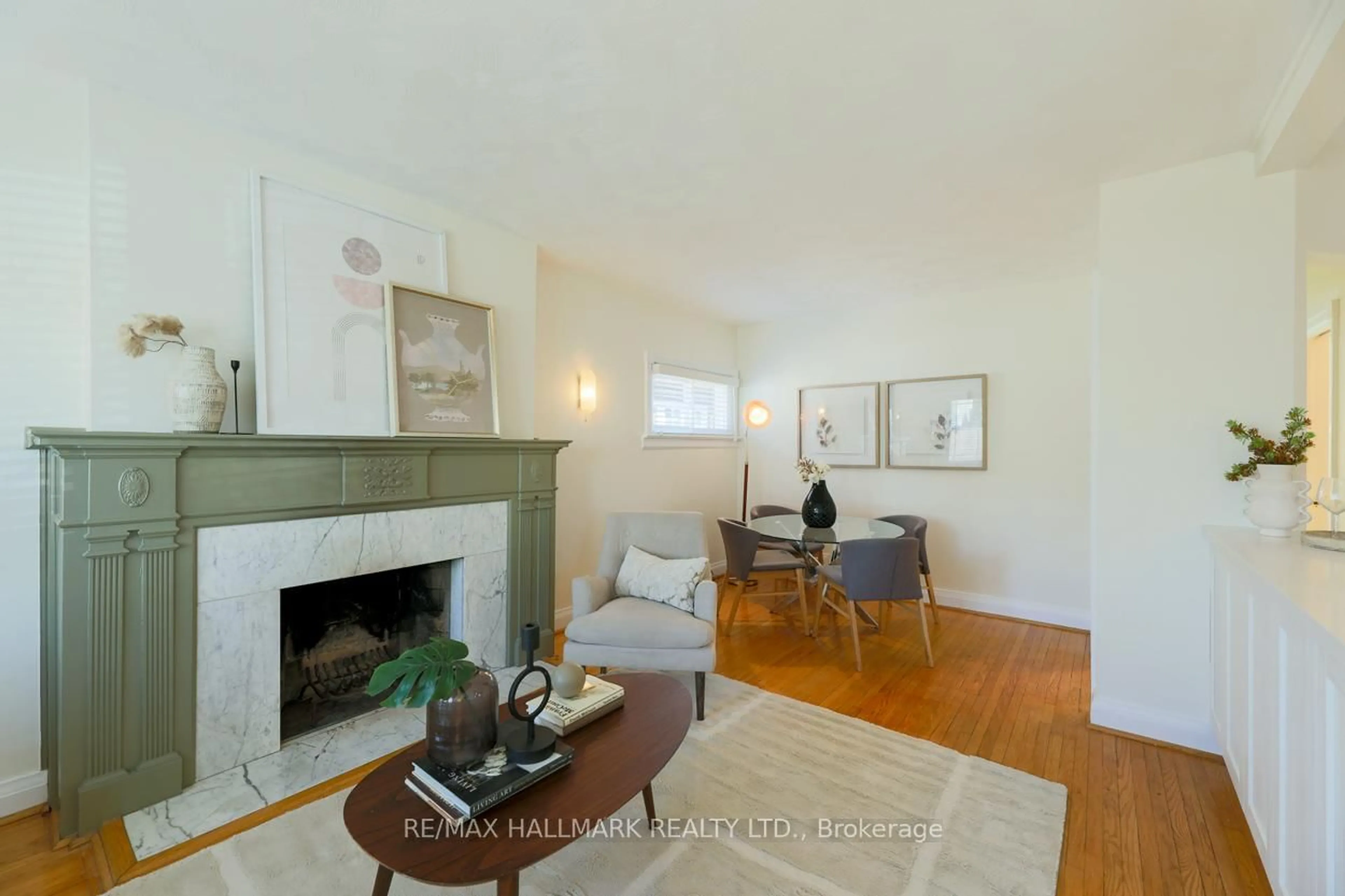 Living room with furniture, wood/laminate floor for 105 Dunington Dr, Toronto Ontario M1N 3E4