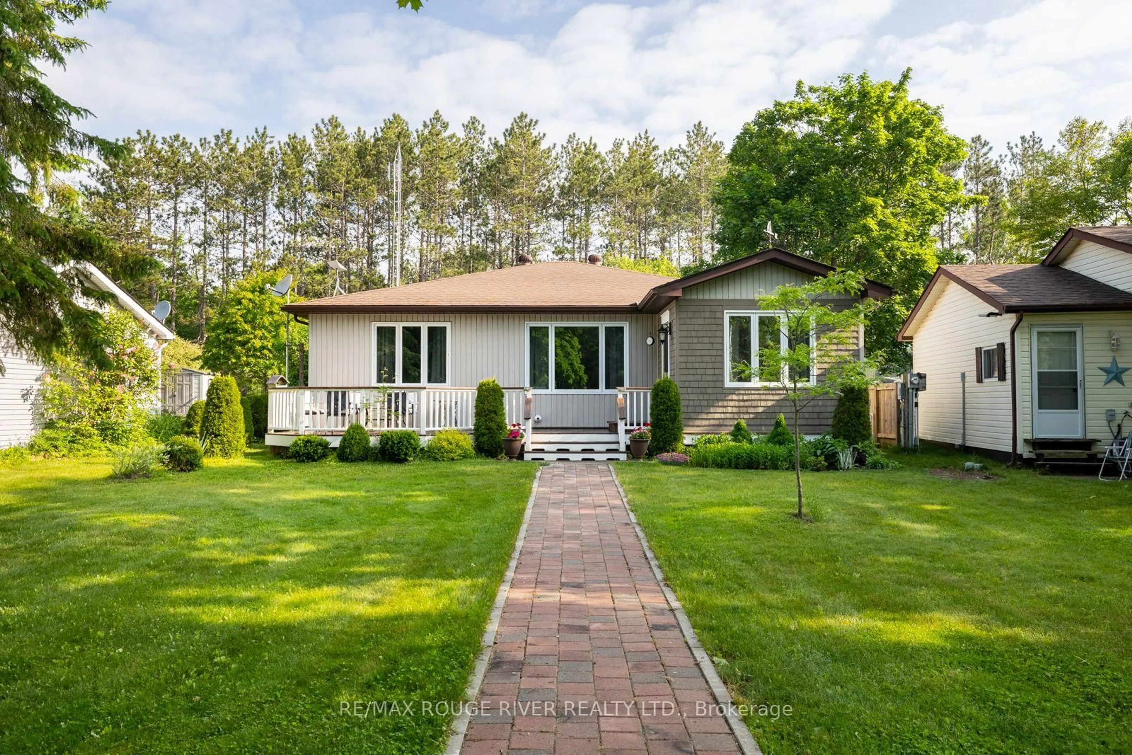 Home with vinyl exterior material, street for 10126 Longsault Rd #14, Clarington Ontario L0B 1J0