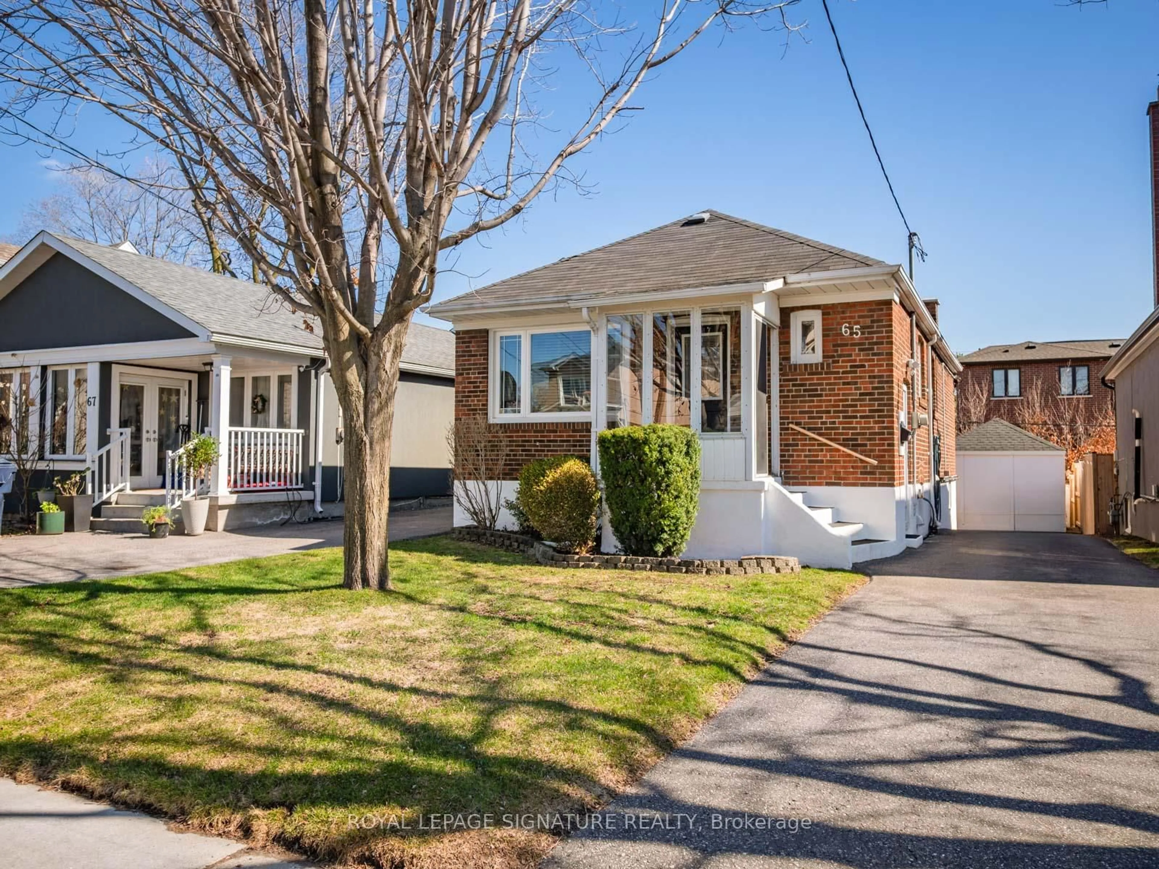 Home with brick exterior material, street for 65 Galbraith Ave, Toronto Ontario M4B 2B6