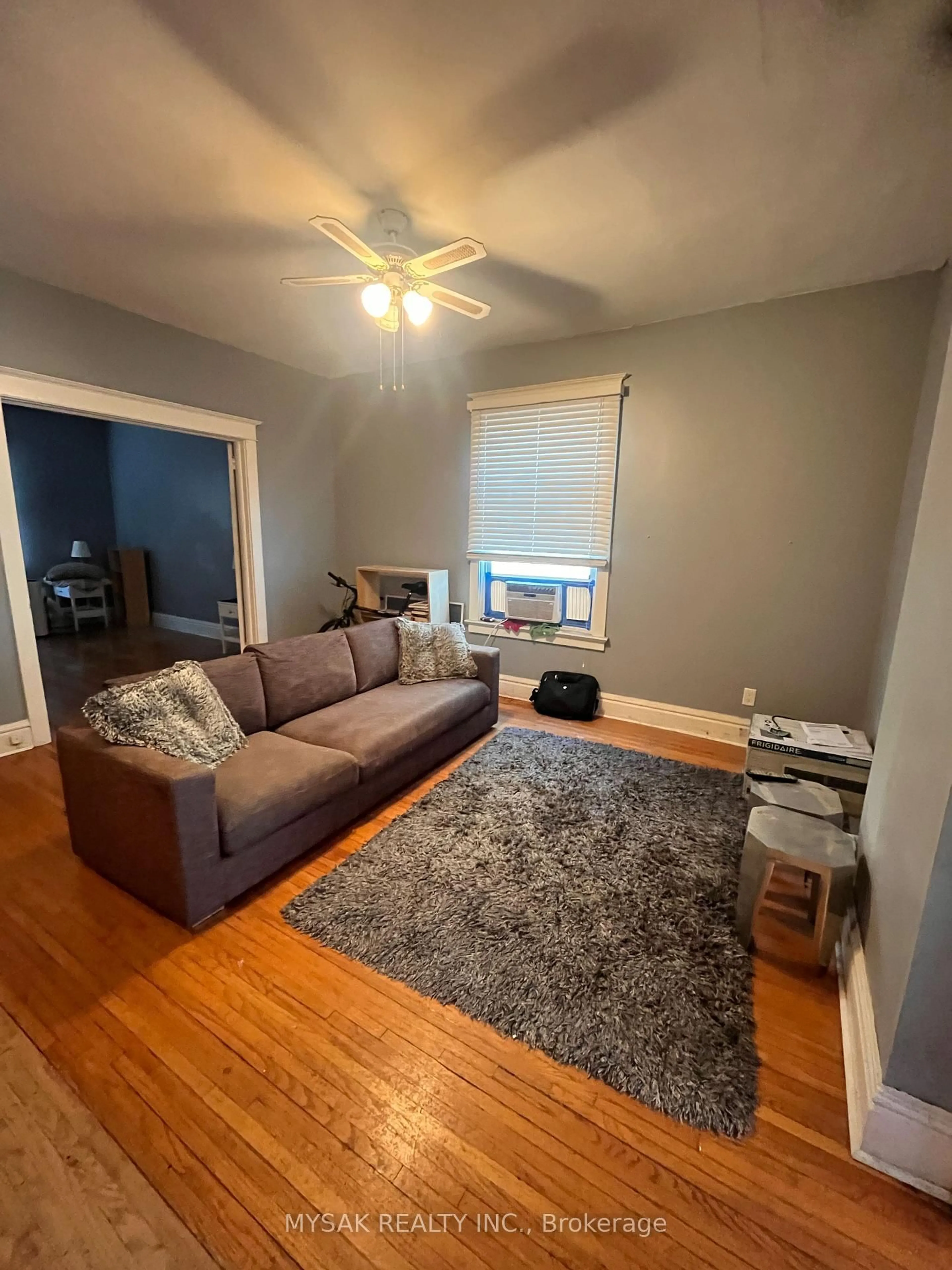 Living room with furniture, unknown for 269 Sammon Ave, Toronto Ontario M4J 1Z8