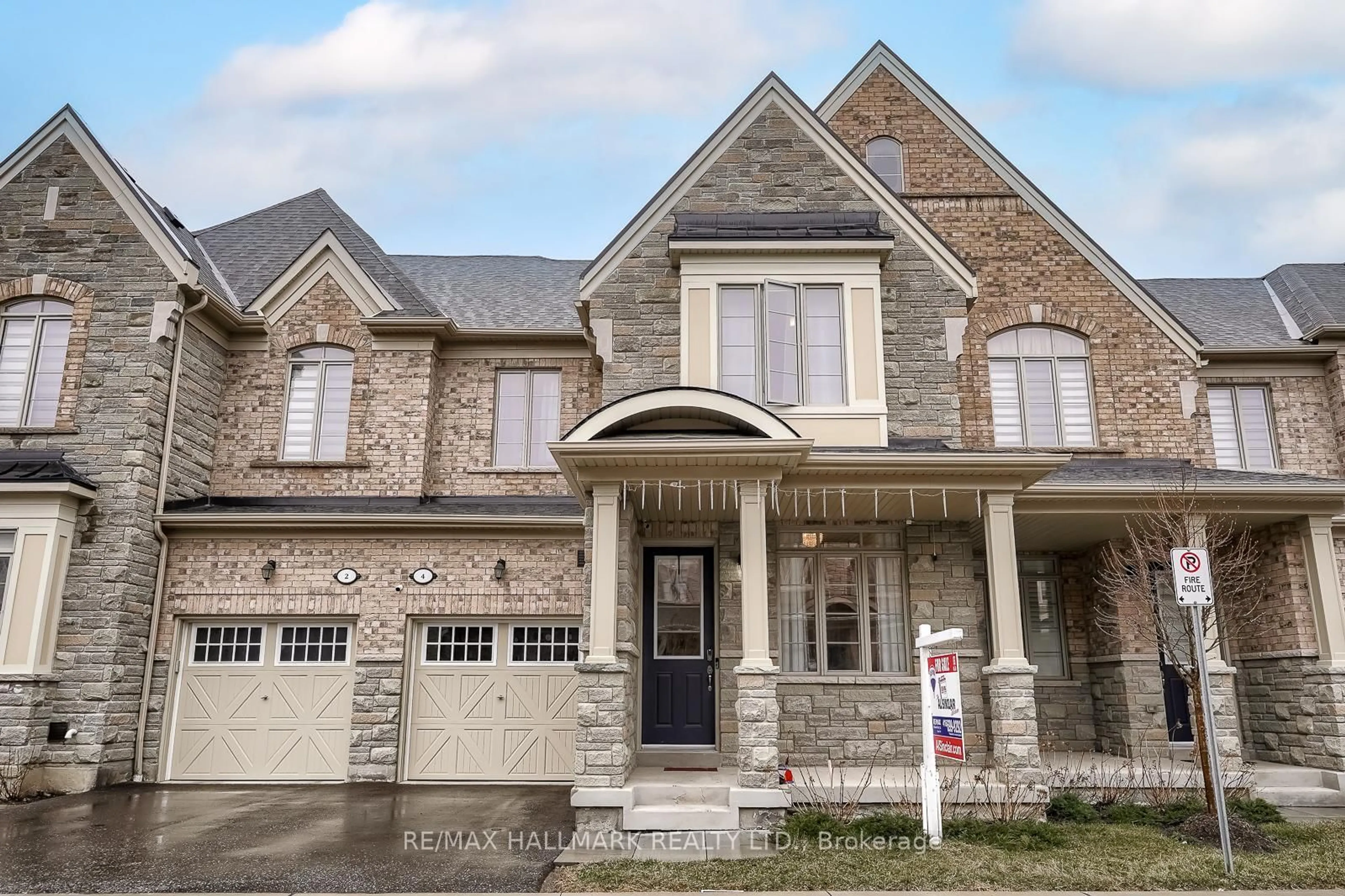 Home with brick exterior material, street for 4 Hickling Lane, Ajax Ontario L1T 0N6