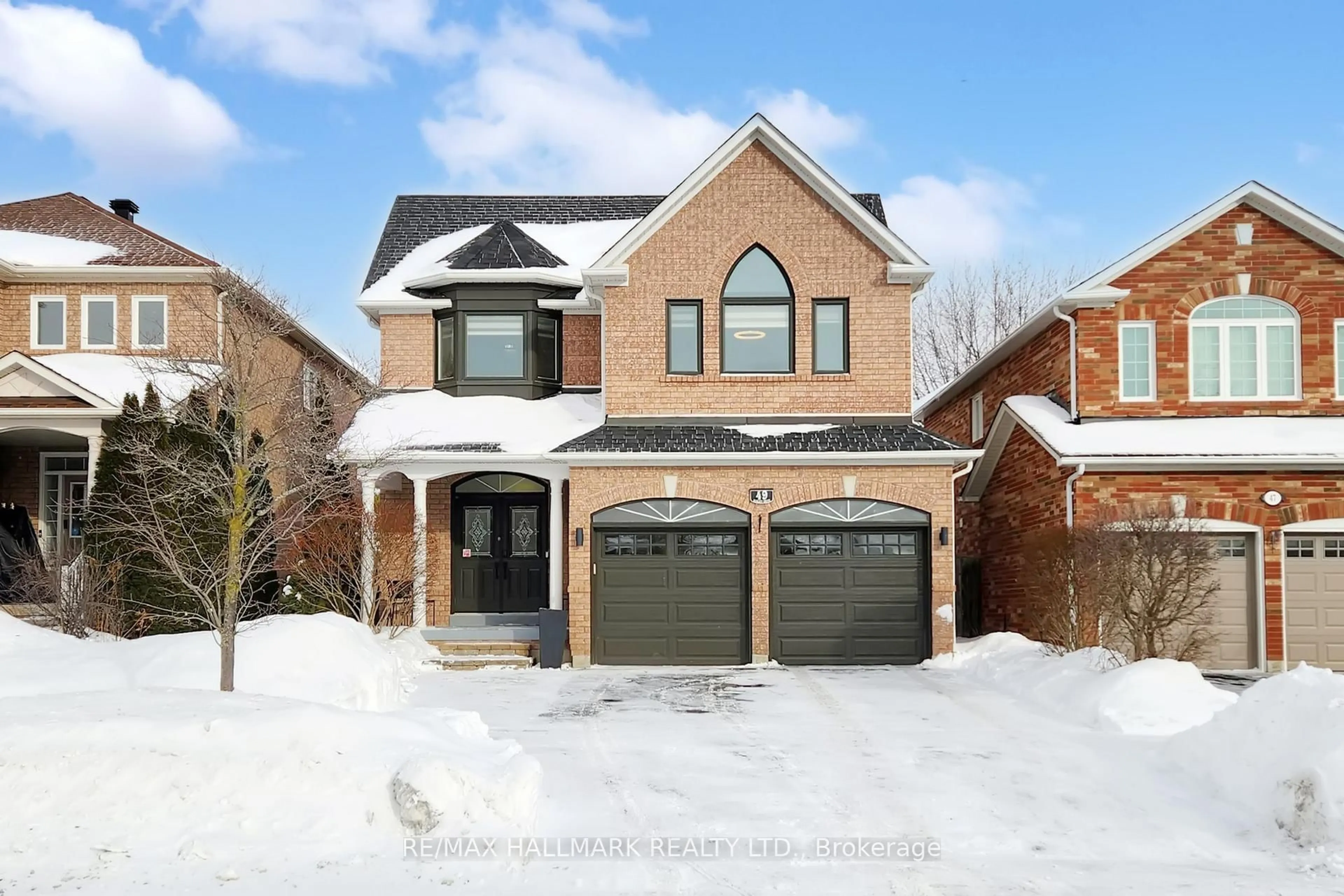 Home with brick exterior material, street for 49 Sonley Dr, Whitby Ontario L1R 3B7