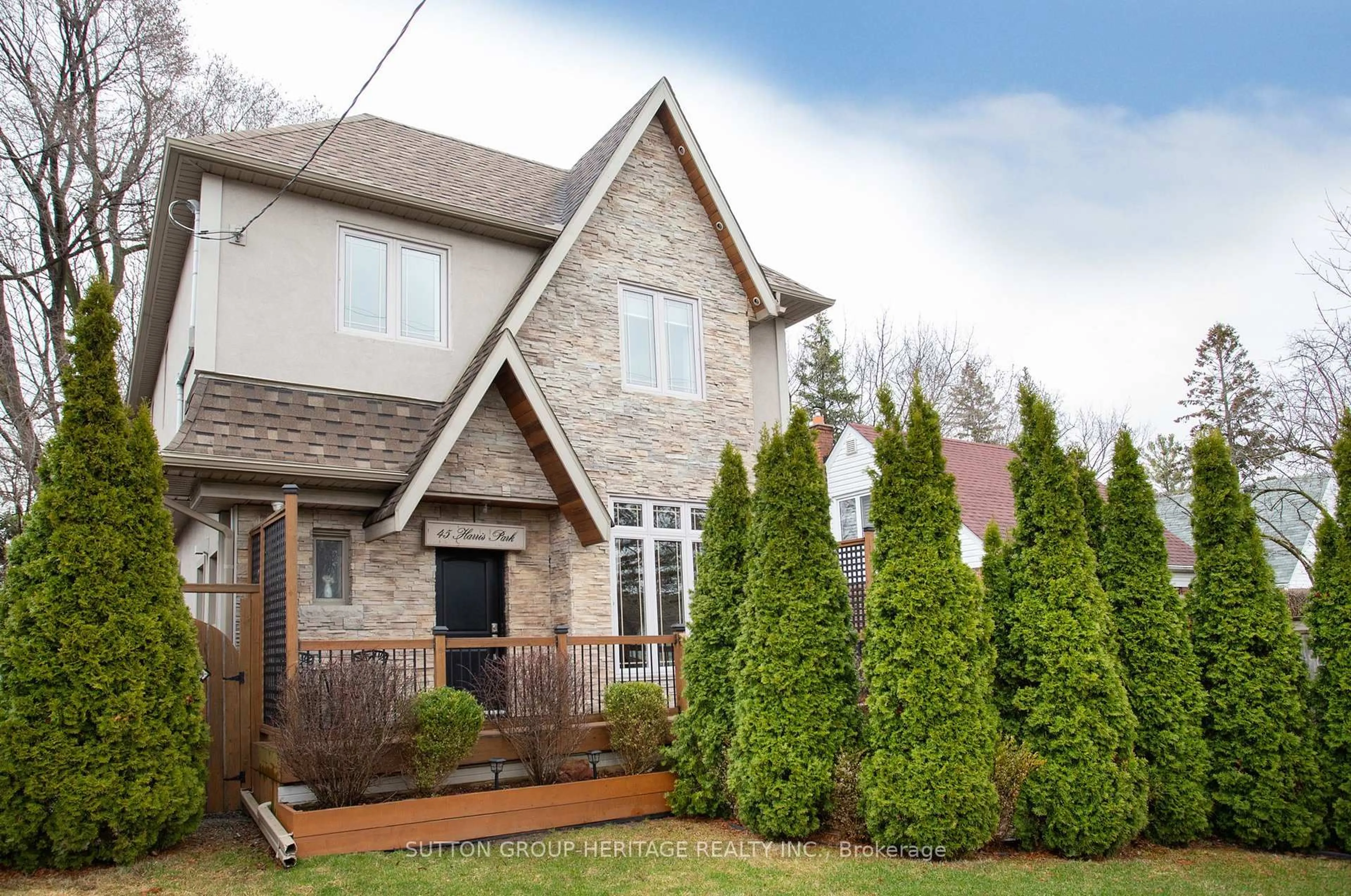 Home with brick exterior material, street for 45 Harris Park Dr, Toronto Ontario M1L 3A5