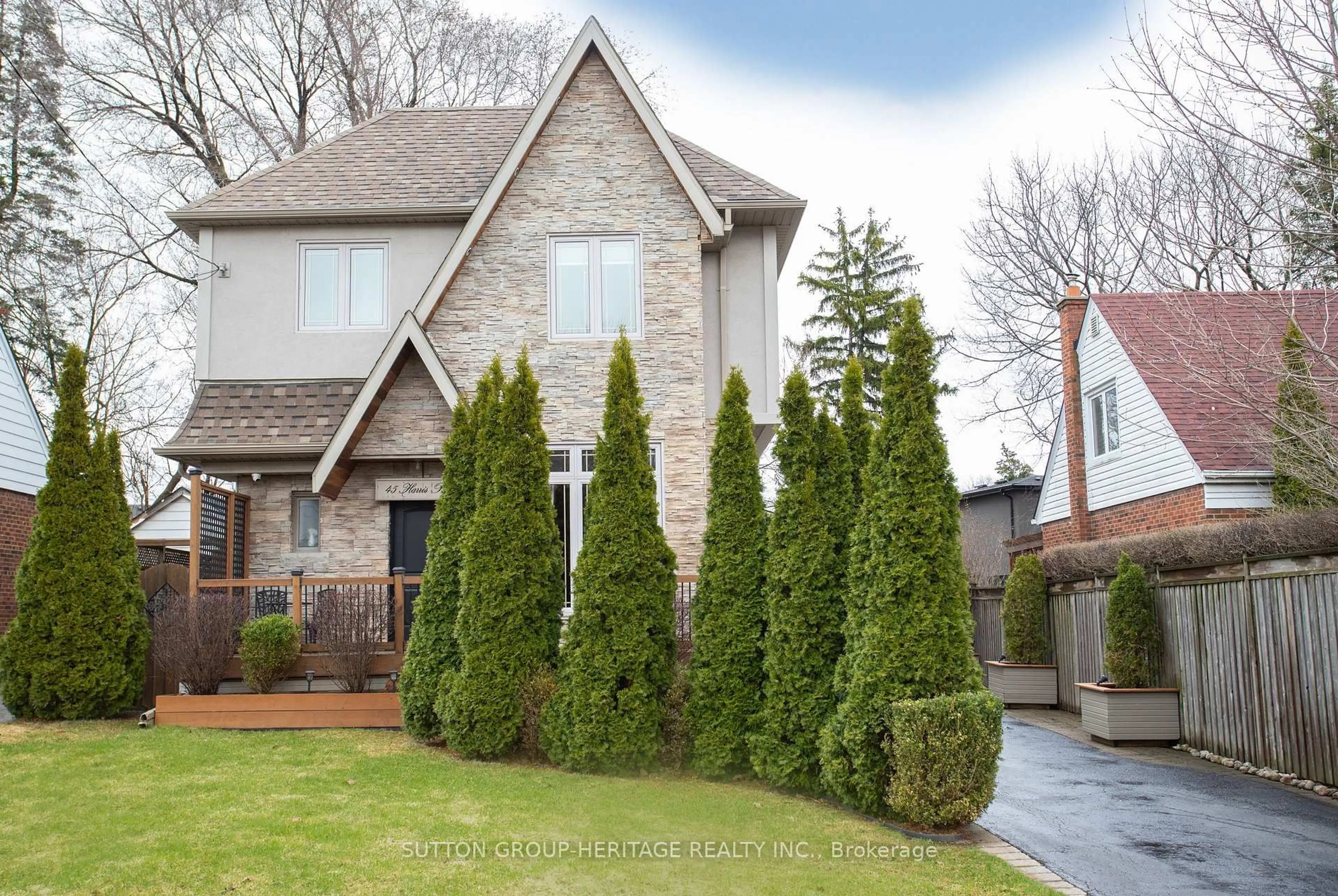 Home with brick exterior material, street for 45 Harris Park Dr, Toronto Ontario M1L 3A5