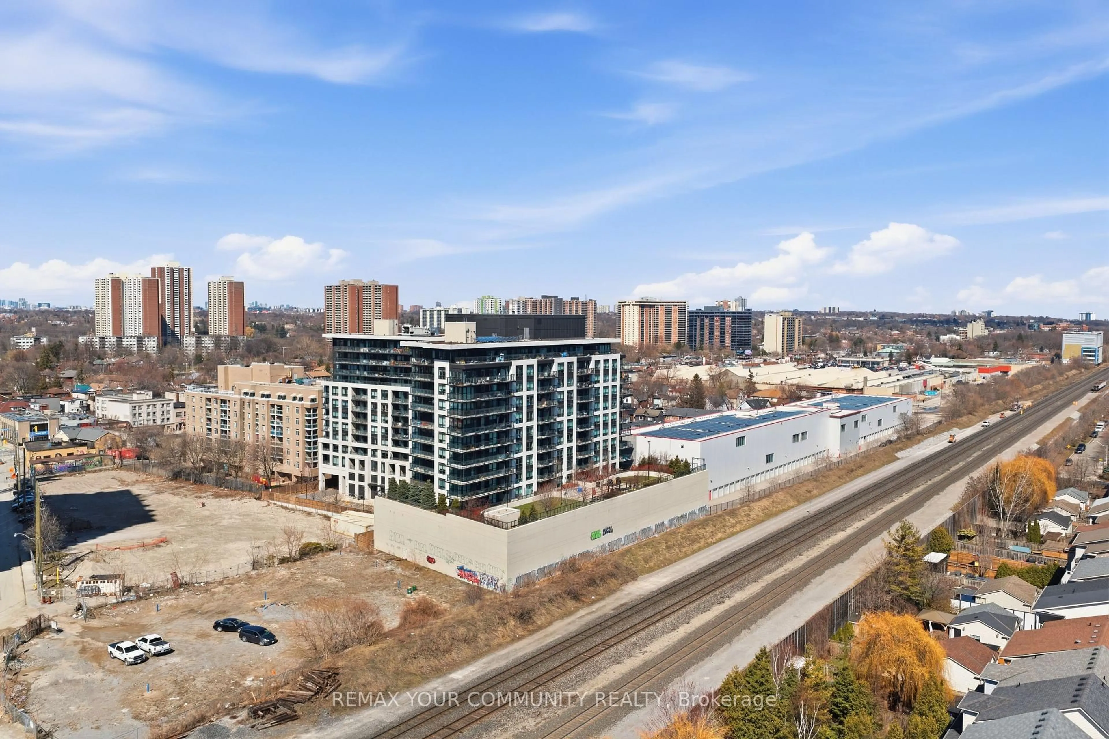 A pic from outside/outdoor area/front of a property/back of a property/a pic from drone, city buildings view from balcony for 8 Trent Ave #407, Toronto Ontario M4C 0A6