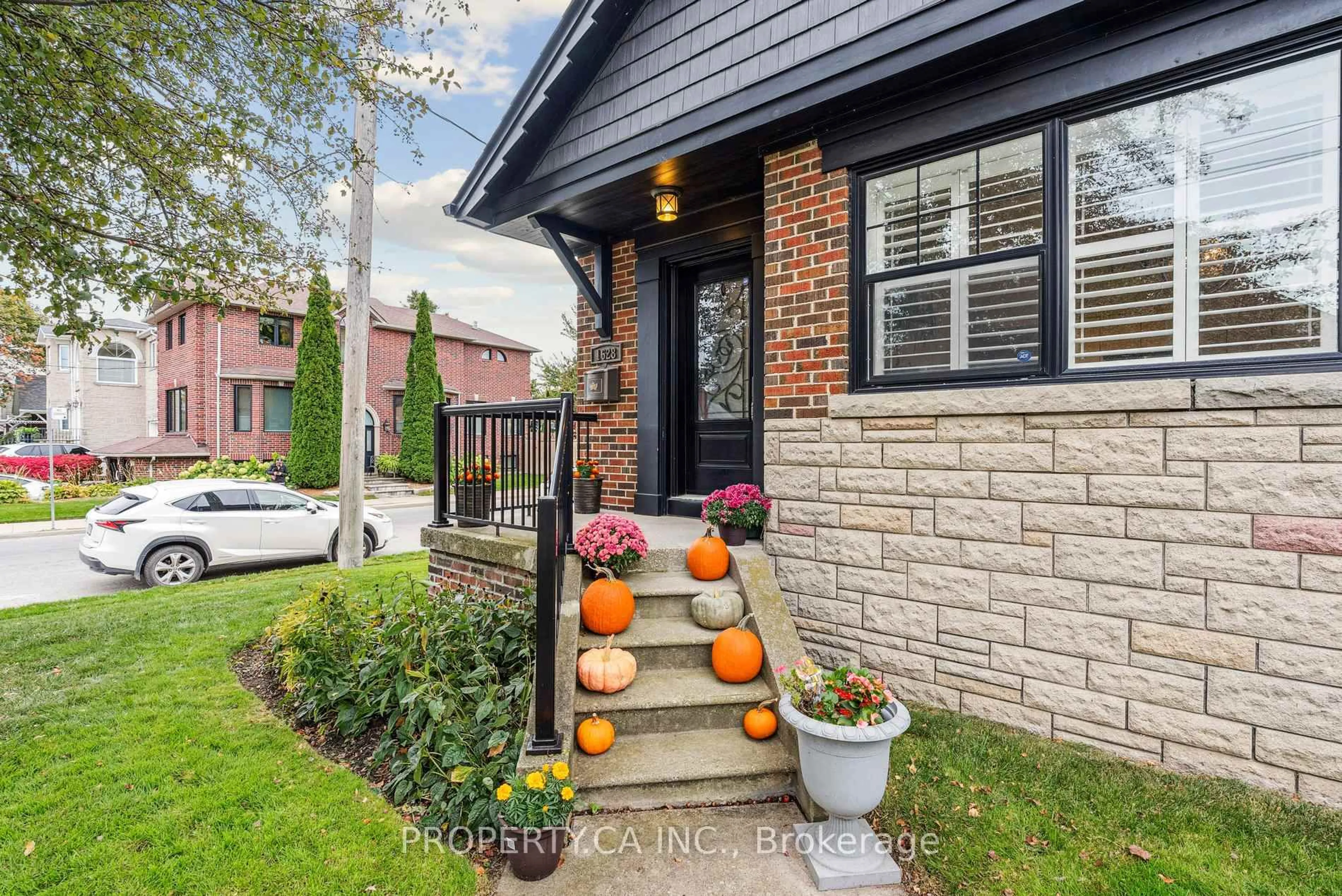 Home with brick exterior material, street for 1628 Woodbine Heights Blvd, Toronto Ontario M4B 3A5