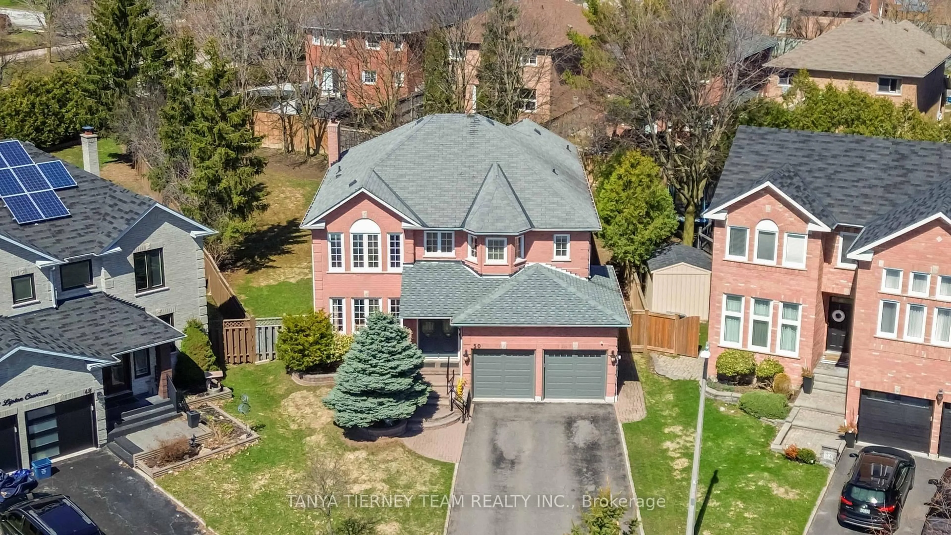 A pic from outside/outdoor area/front of a property/back of a property/a pic from drone, street for 50 Lipton Cres, Whitby Ontario L1R 1W7