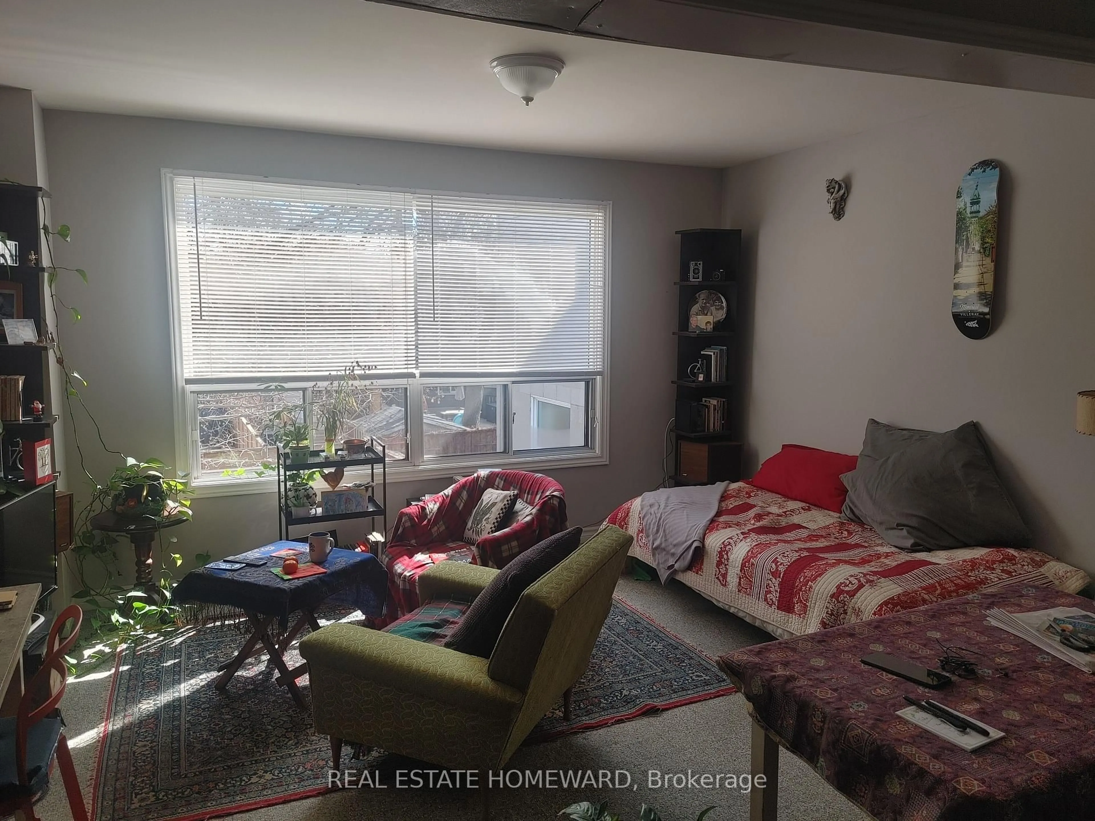 Living room with furniture, floor is not visible for 1191 Woodbine Ave, Toronto Ontario M4C 4E1