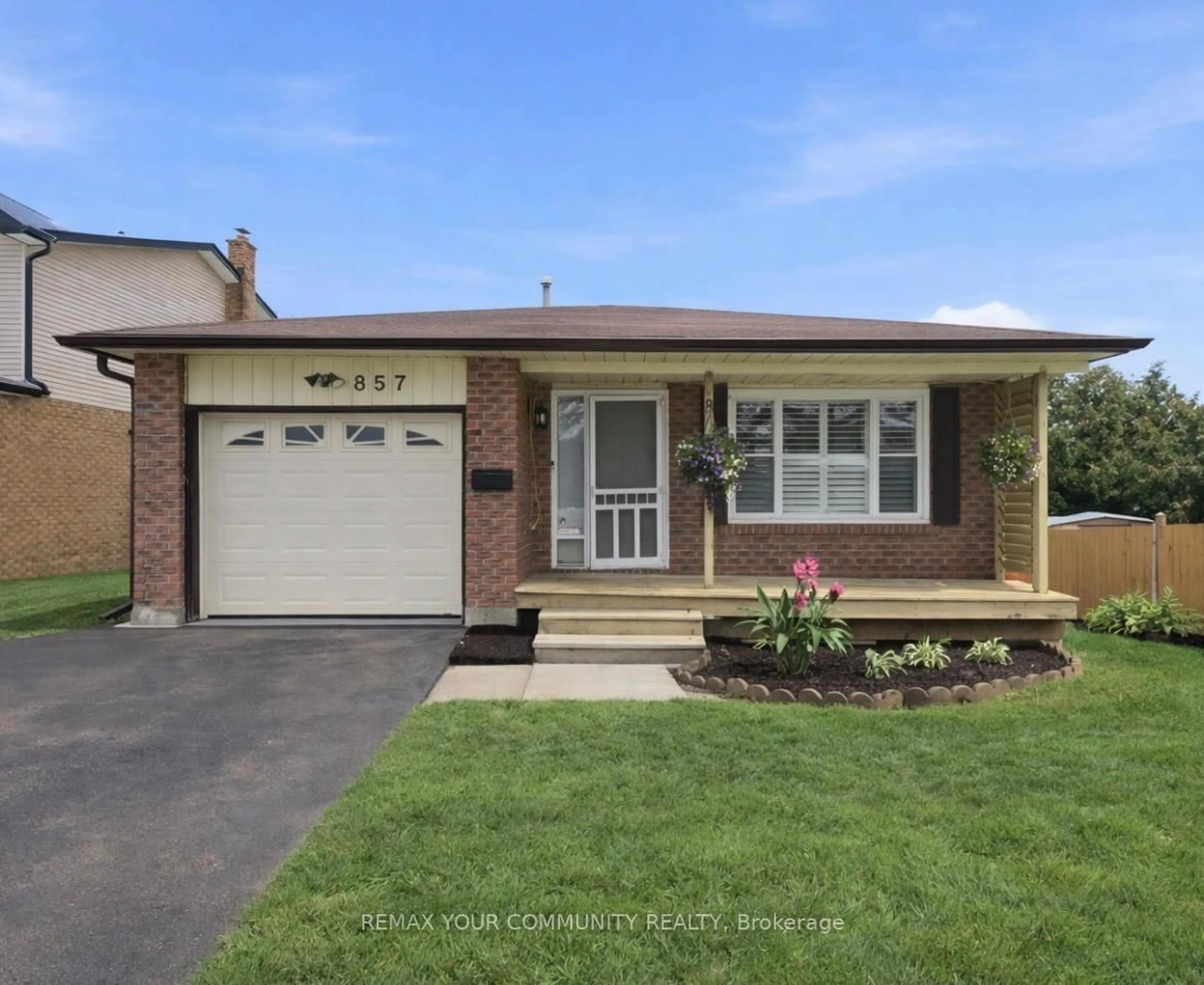 Home with brick exterior material, street for 857 Copperfield Dr, Oshawa Ontario L1K 1S3