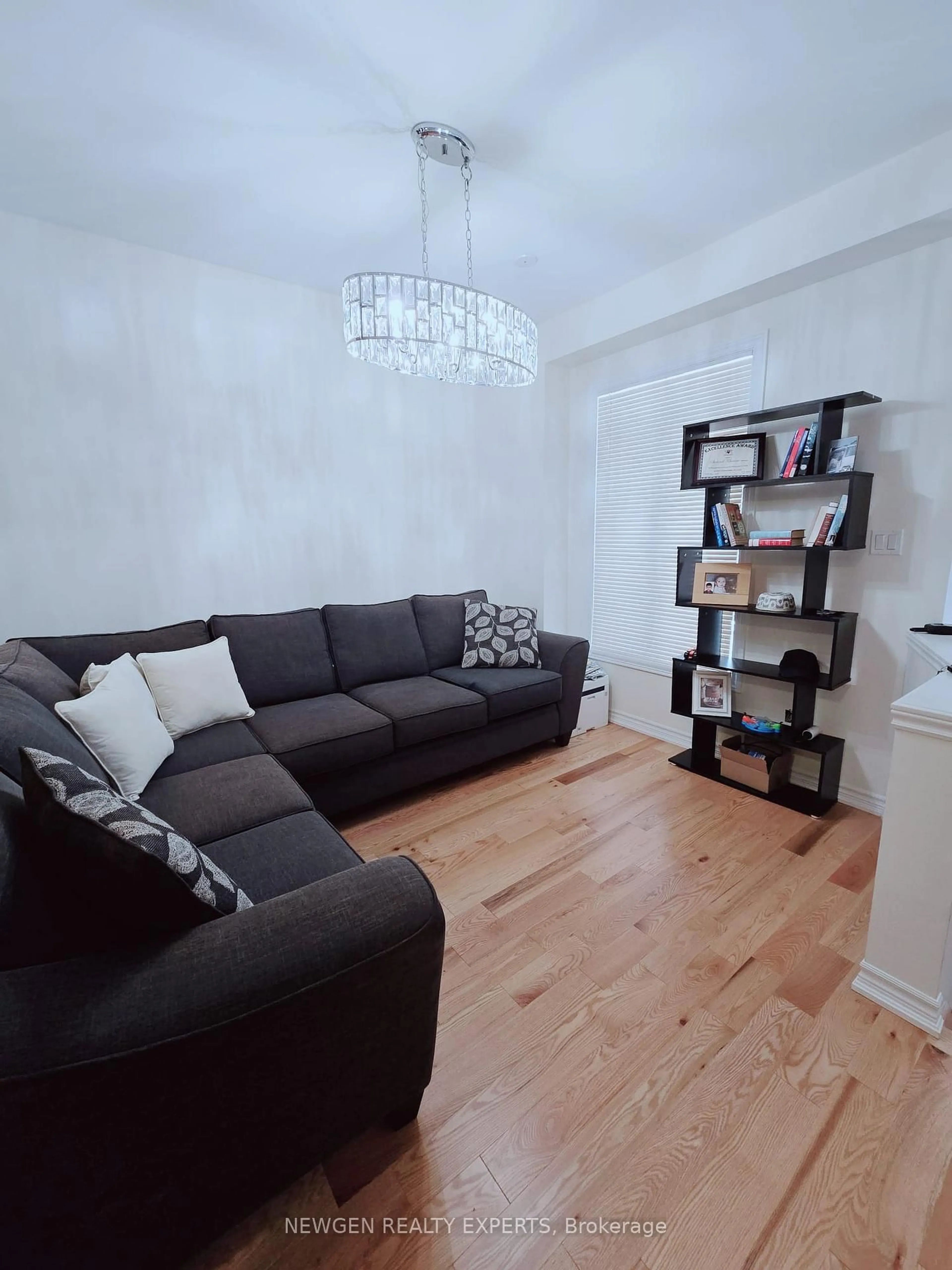 Living room with furniture, wood/laminate floor for 12 cachia Lane, Ajax Ontario L1T 0P8