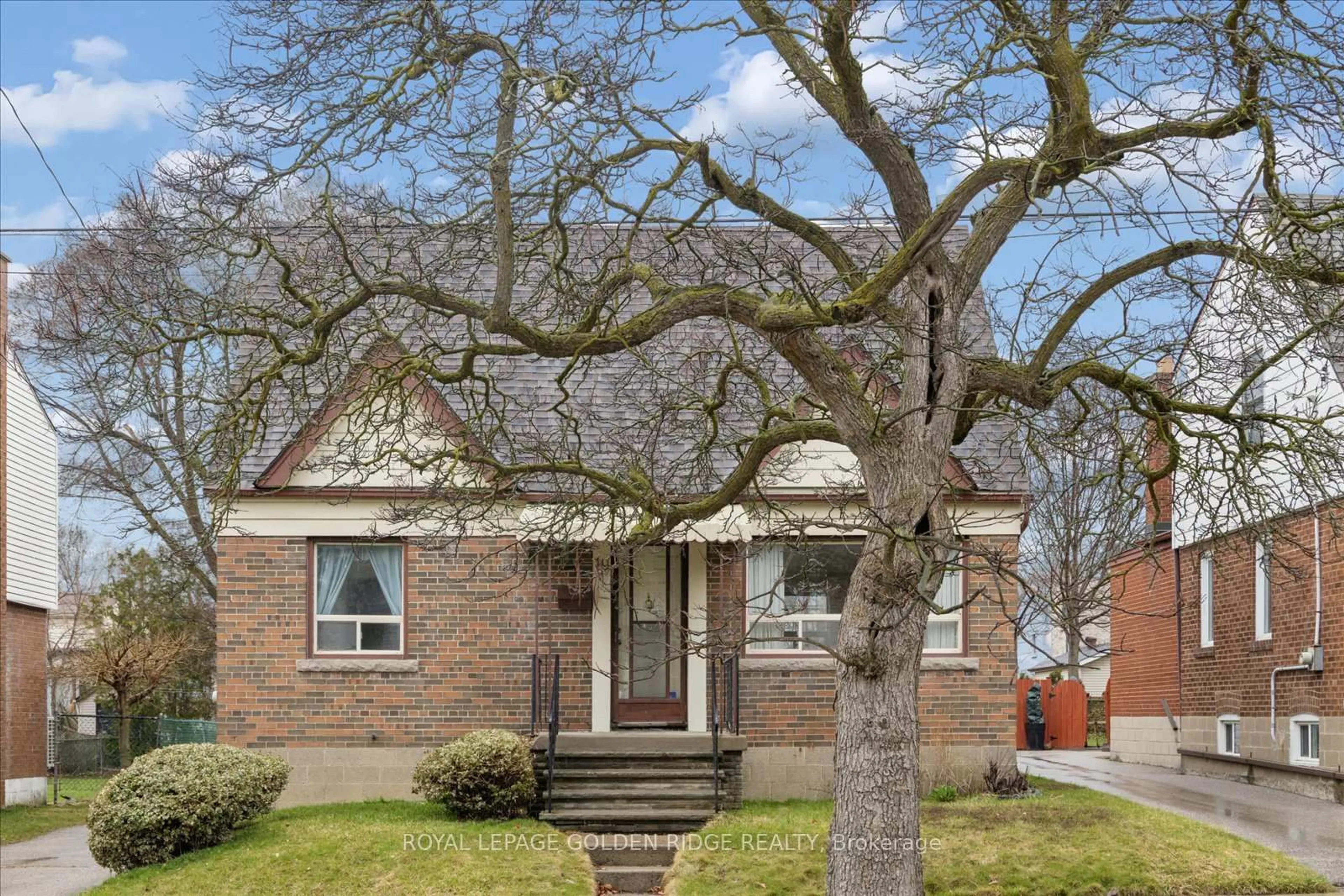 Home with brick exterior material, street for 10 Eastgate Cres, Toronto Ontario M1L 1W9