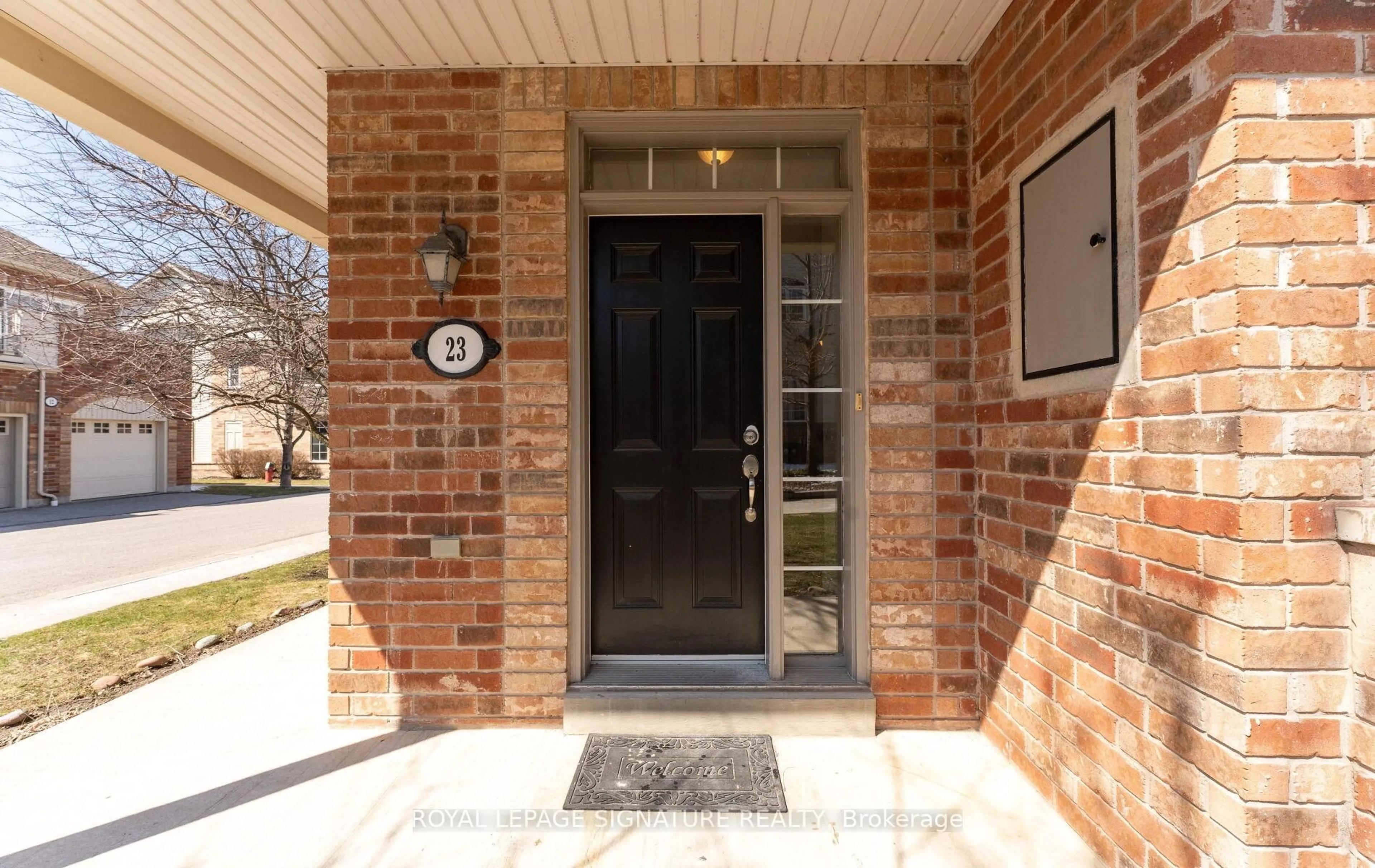 Home with brick exterior material, street for 23 Yewtree Way, Whitby Ontario L1R 0C7