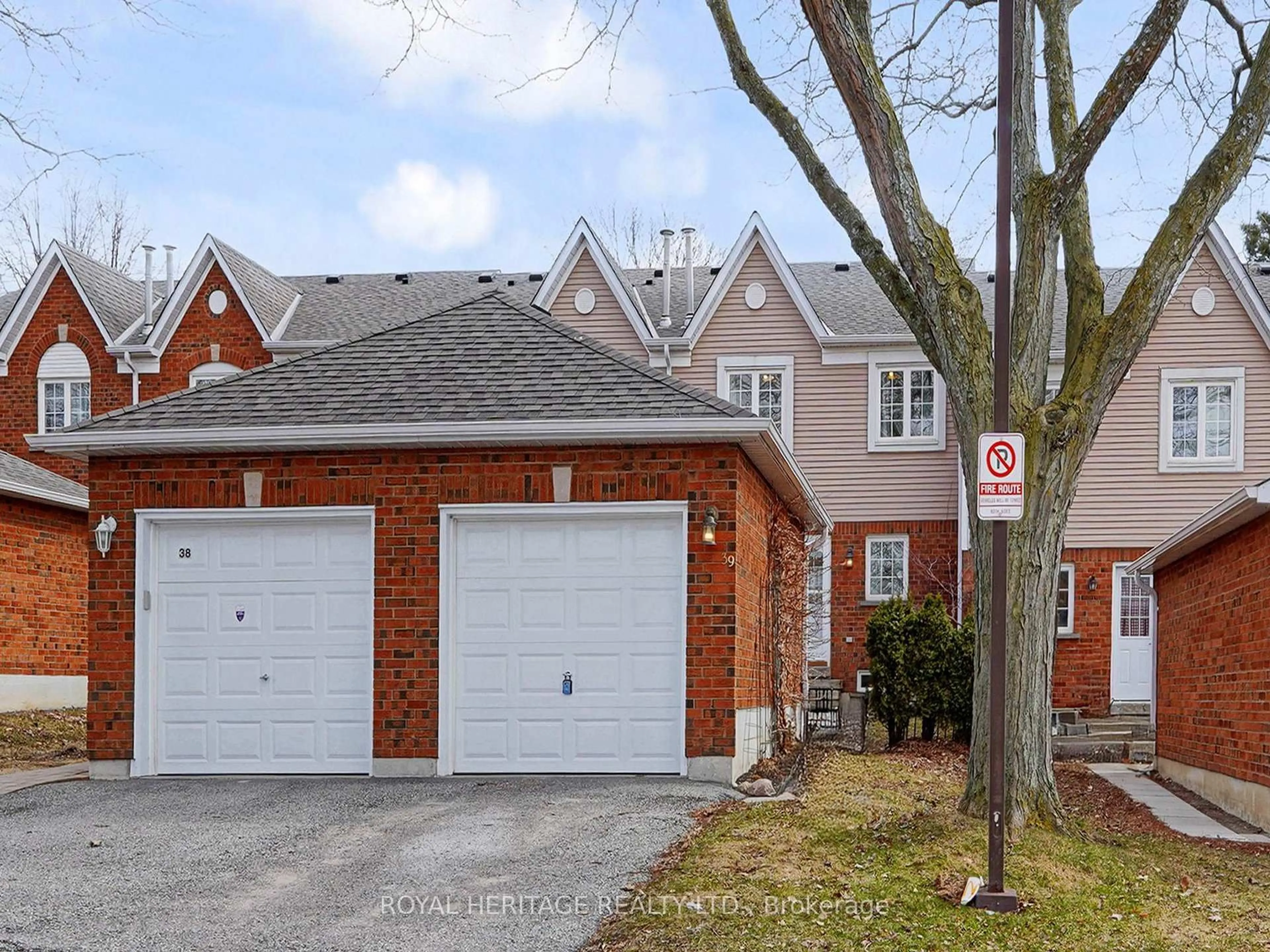 Home with brick exterior material, street for 10 Bassett Blvd #39, Whitby Ontario L1N 9C4