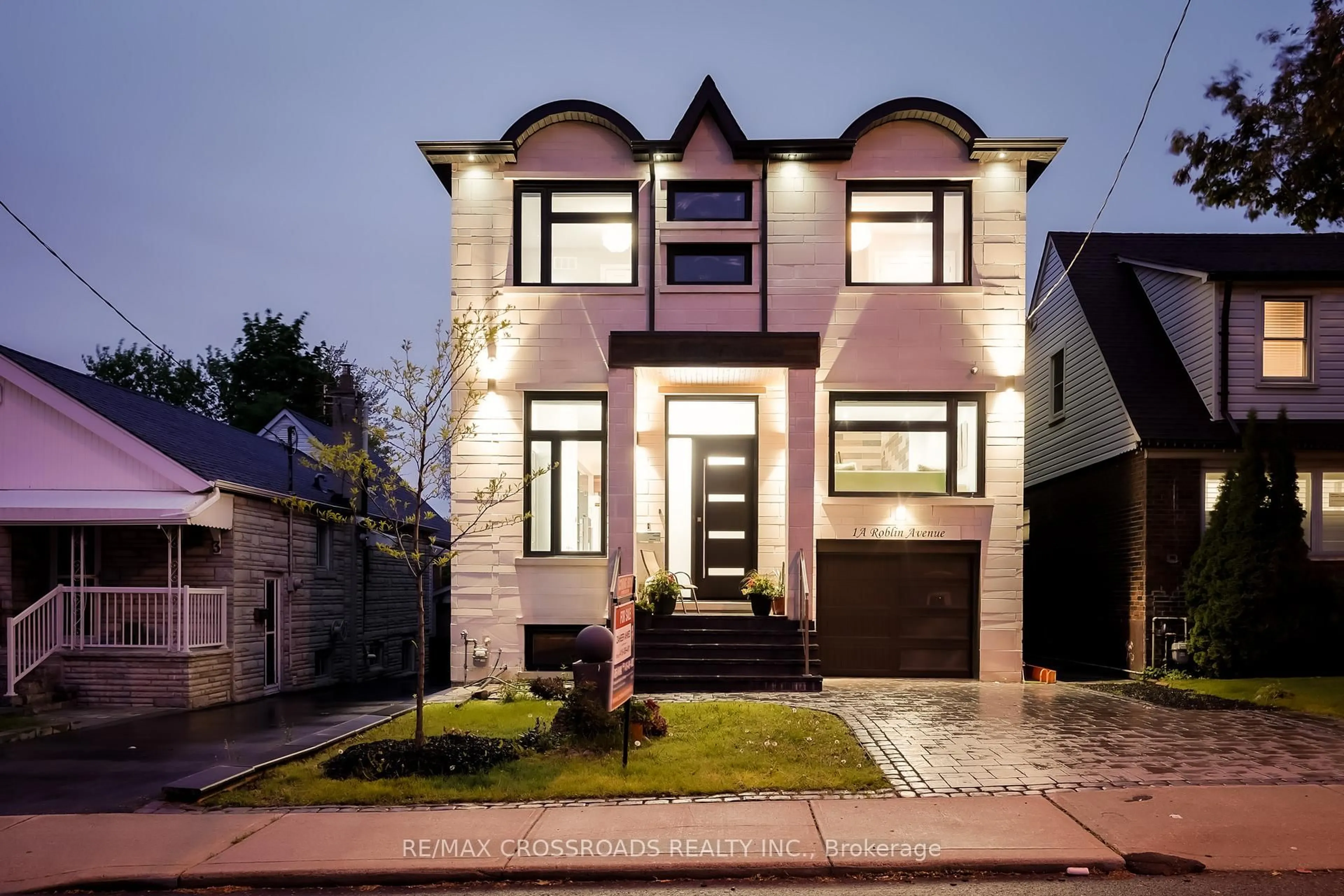 Home with brick exterior material, street for 1A Roblin Ave, Toronto Ontario M4C 3P7