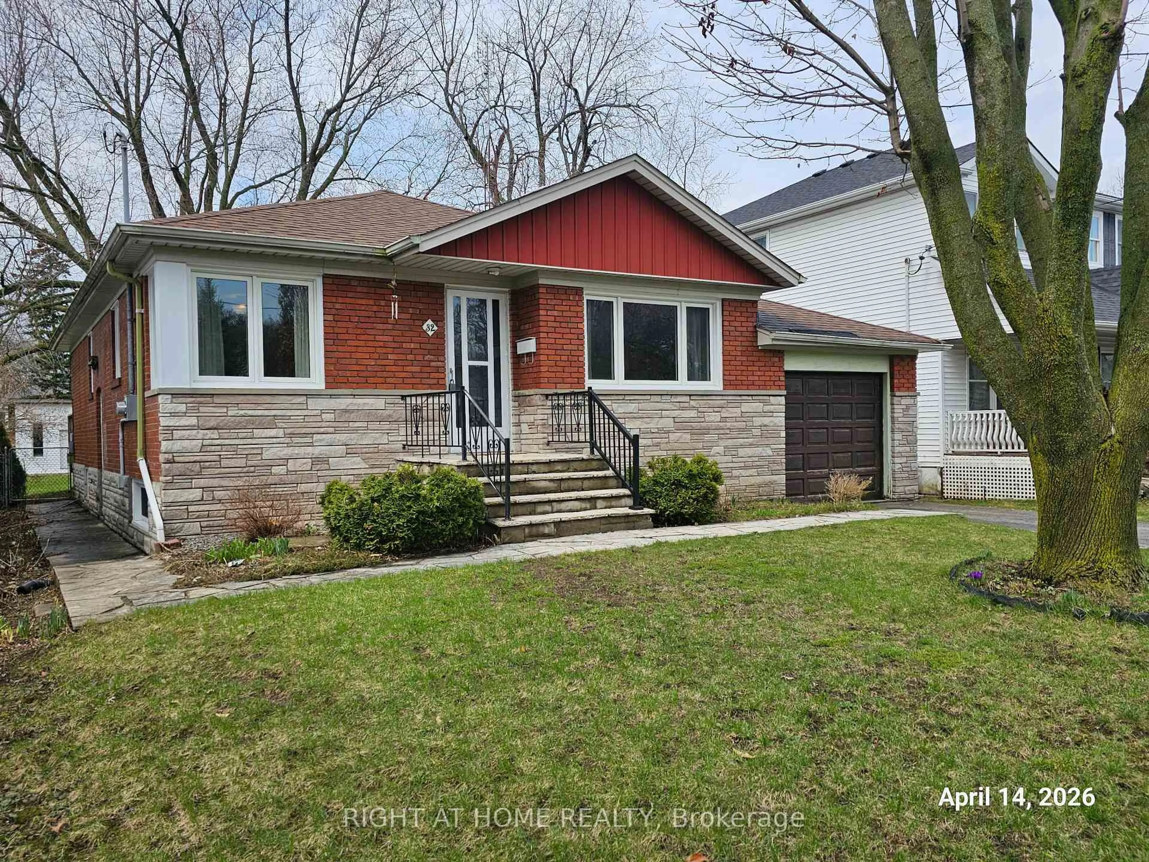 Home with brick exterior material, street for 32 Muir Dr, Toronto Ontario M1M 3B4