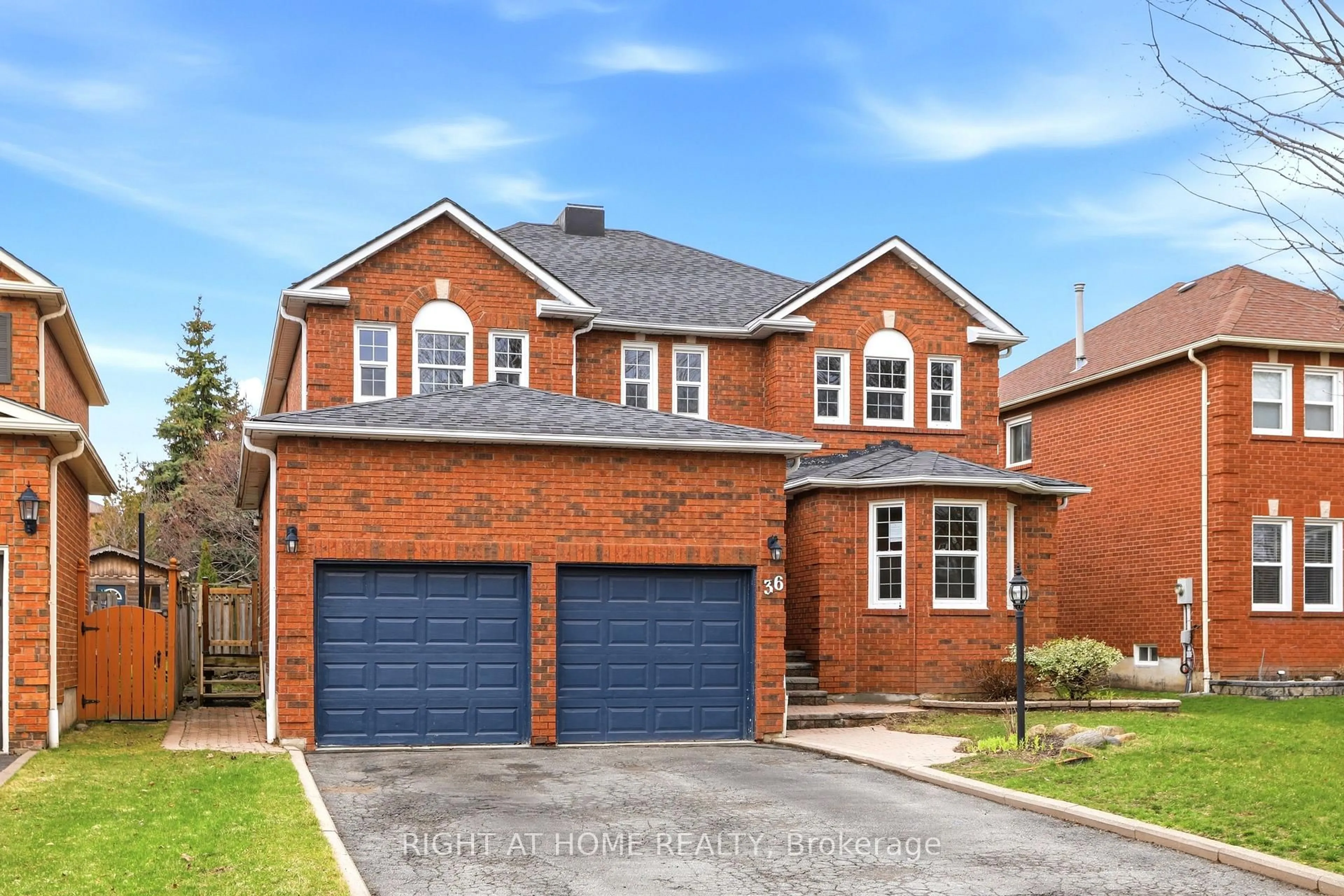 Home with brick exterior material, street for 36 Ravenview Dr, Whitby Ontario L1R 1Y2