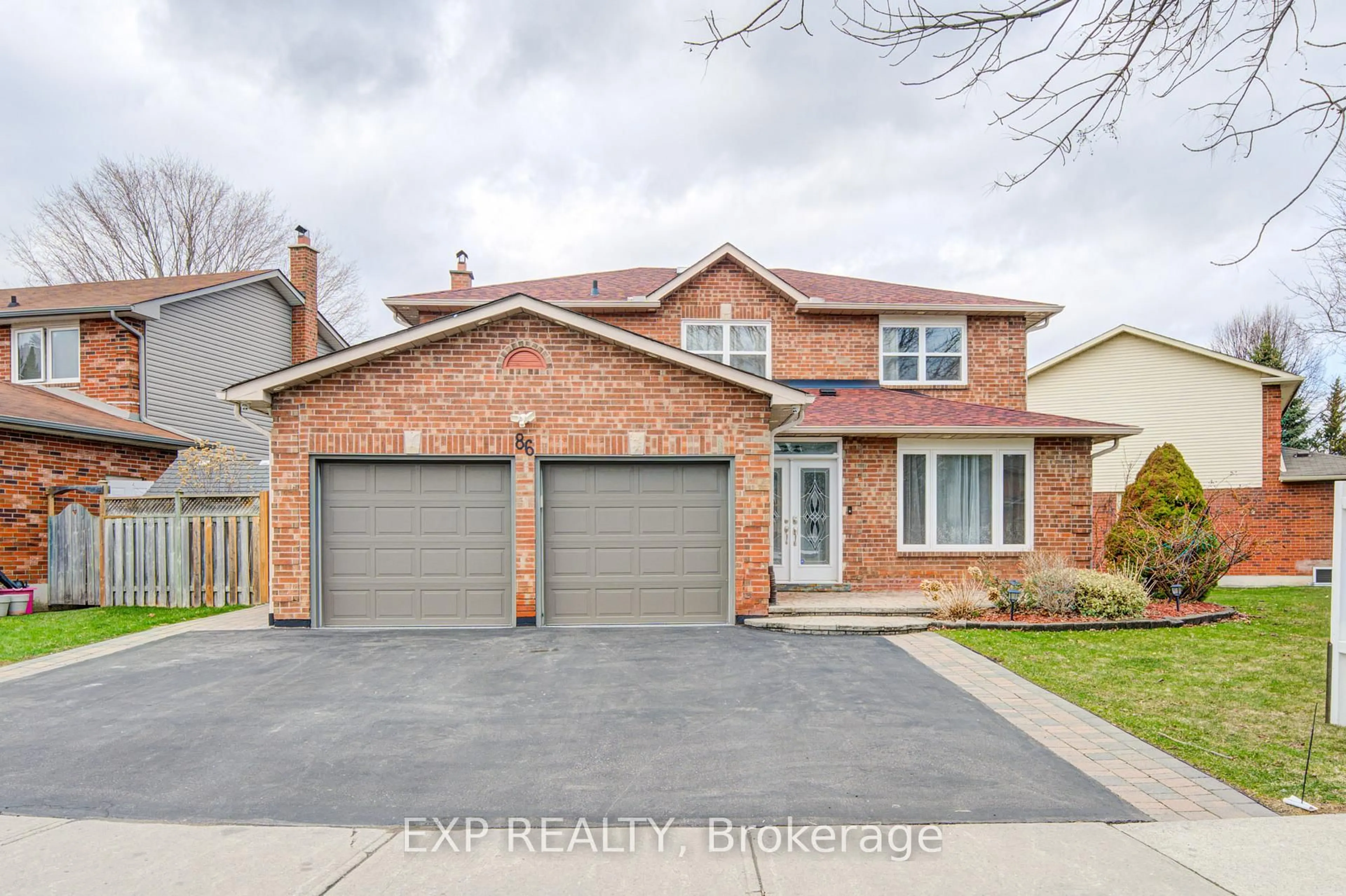 Home with brick exterior material, street for 86 Rollo Dr, Ajax Ontario L1S 7B7