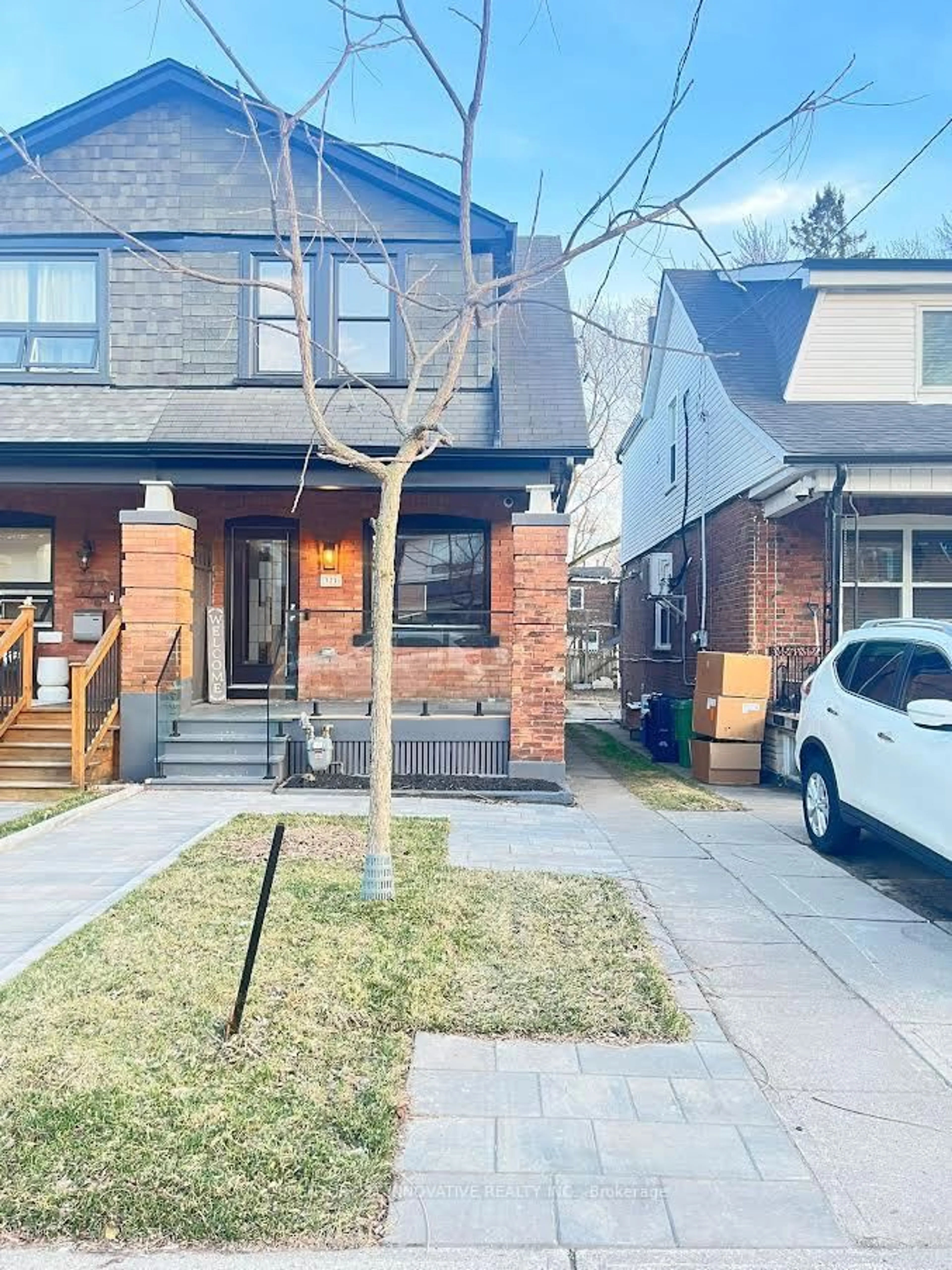 Home with brick exterior material, street for 371 Milverton Blvd, Toronto Ontario M4J 1W1