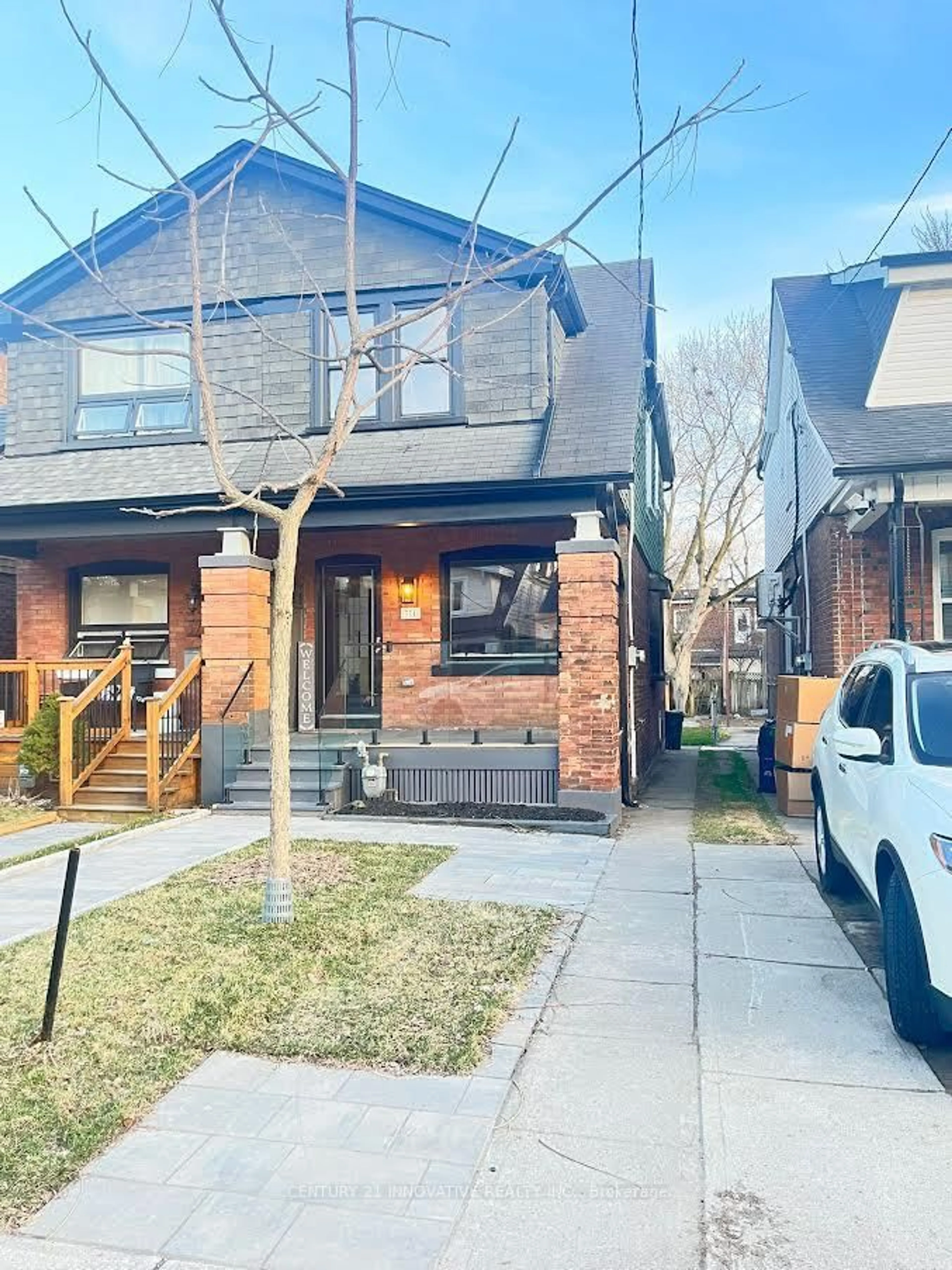 Home with brick exterior material, street for 371 Milverton Blvd, Toronto Ontario M4J 1W1