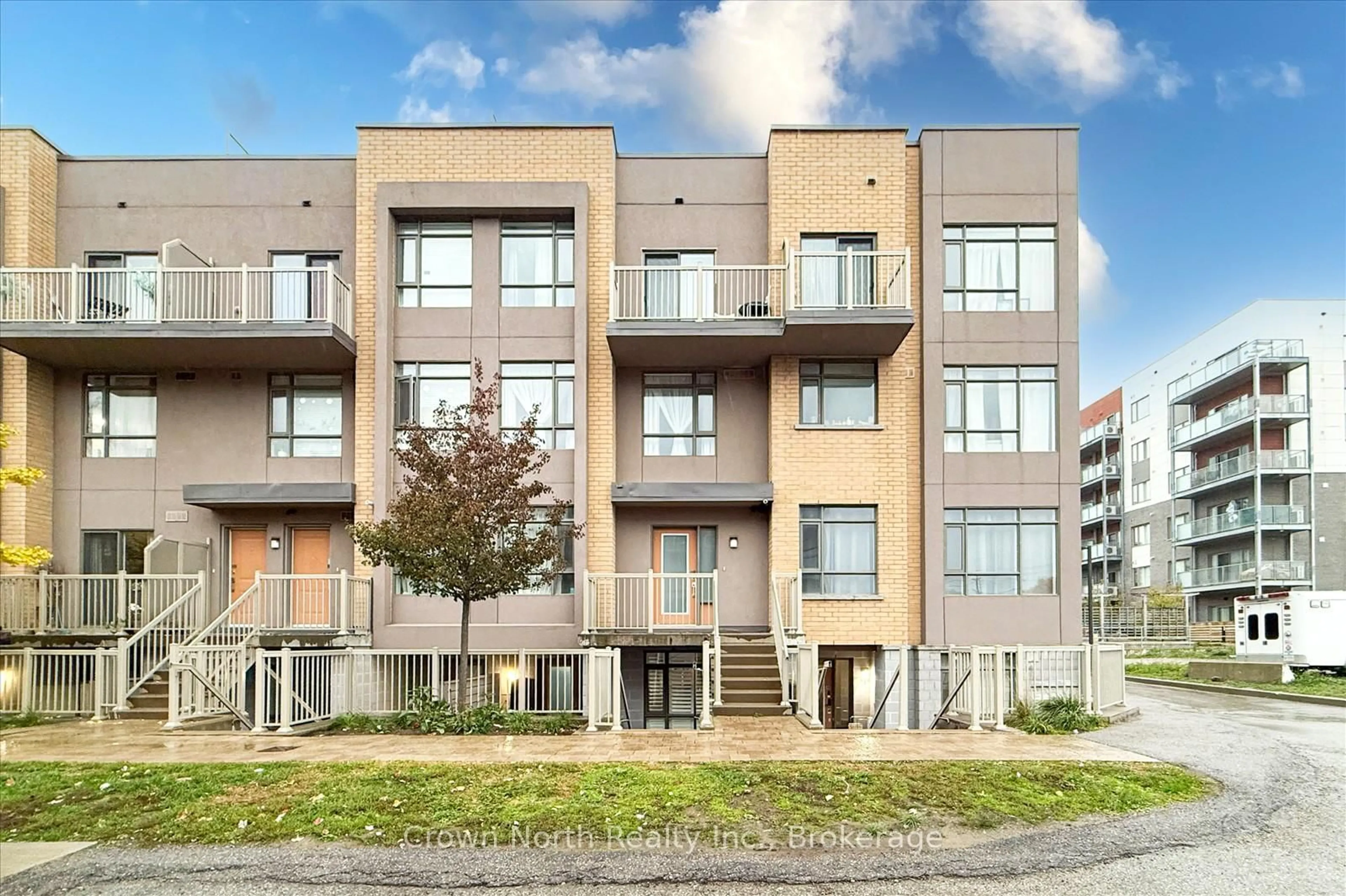 Home with brick exterior material, building for 80 Orchid Place Dr #106, Toronto Ontario M1B 0C4