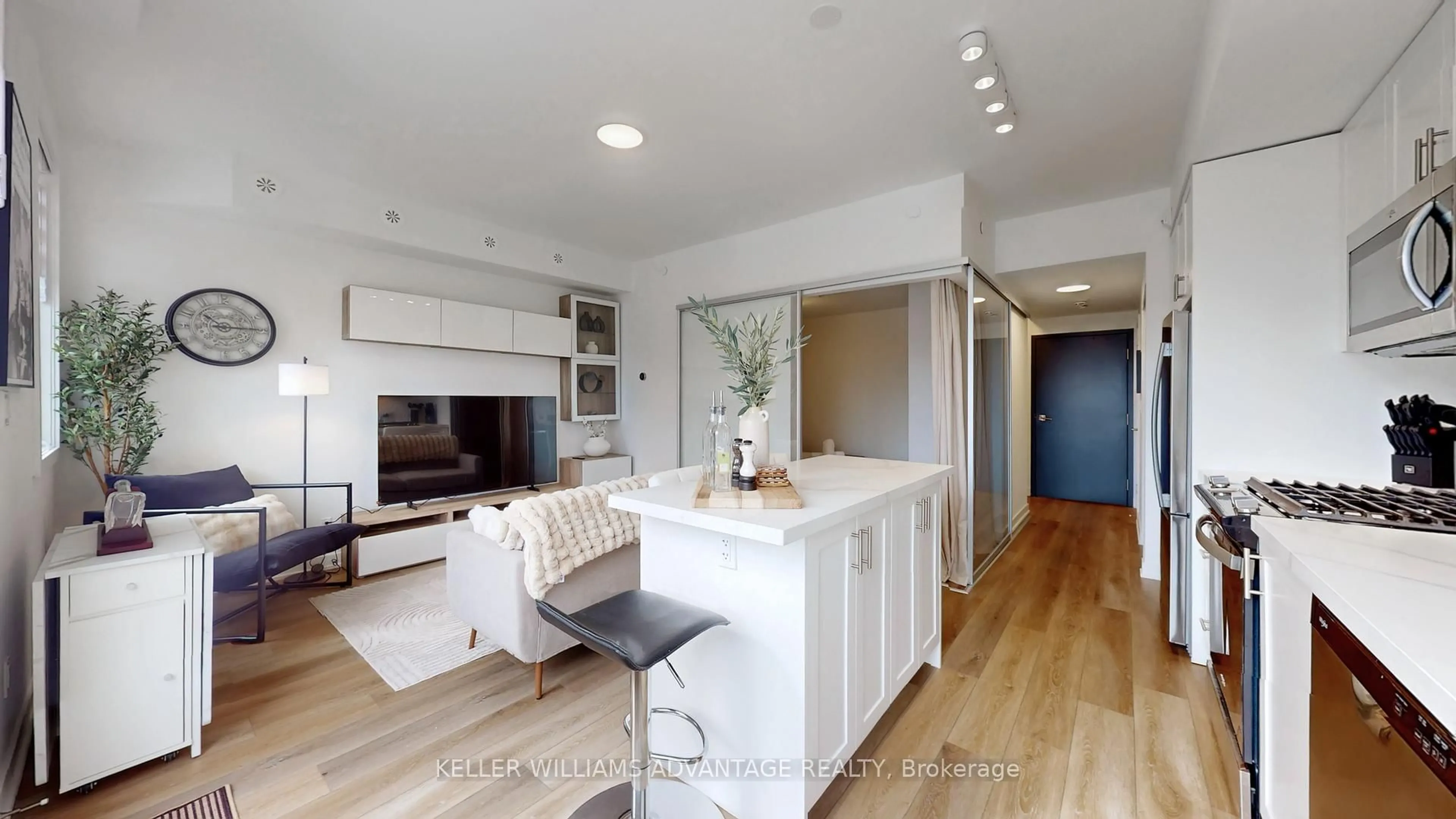 Open concept kitchen, wood/laminate floor for 1479 O'Connor Dr #34, Toronto Ontario M4B 2V5