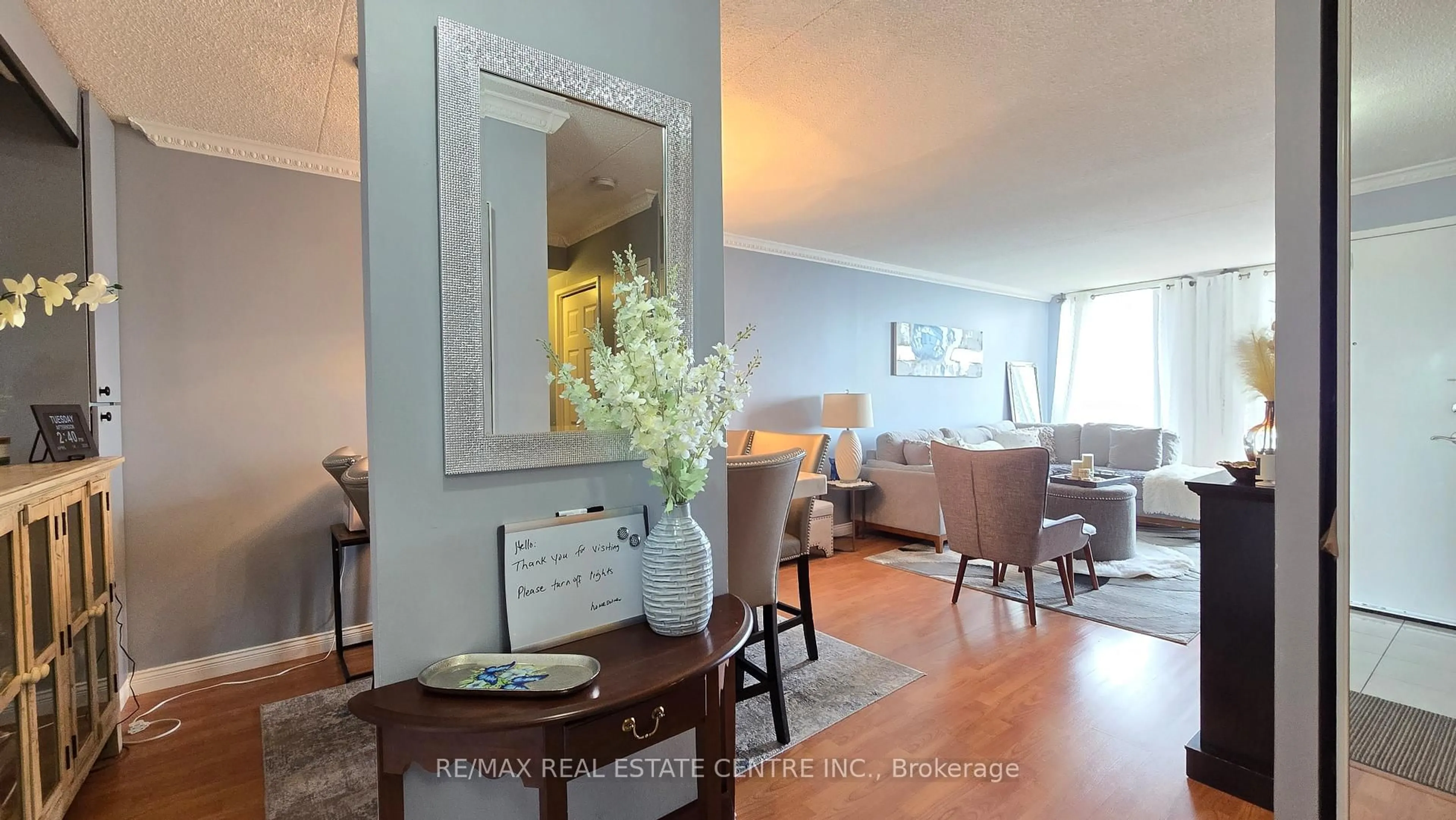 Living room with furniture, wood/laminate floor for 1540 Pickering Pkwy #609, Pickering Ontario L1V 3V9