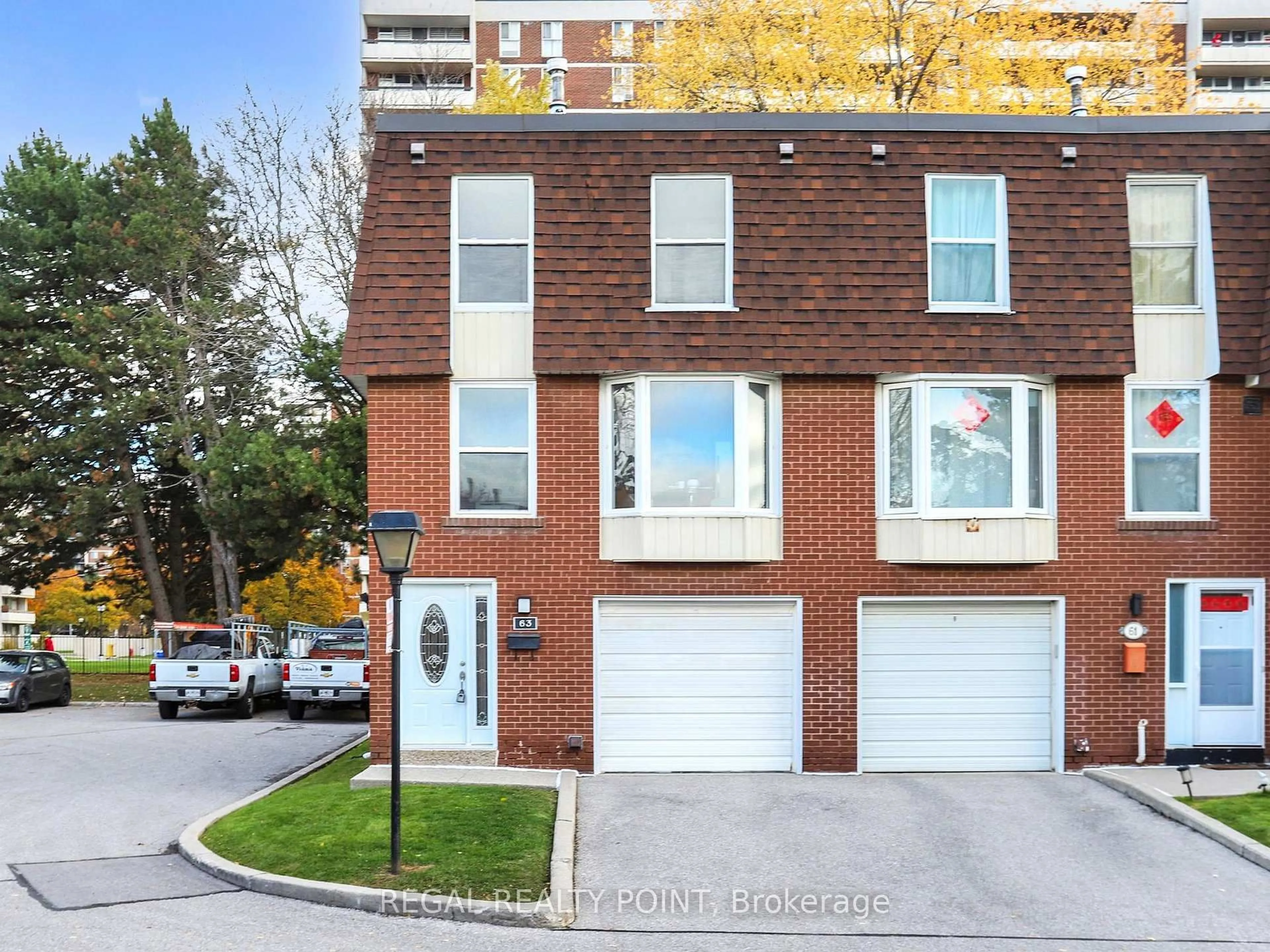 Home with brick exterior material, street for 100 Bridletowne Circ #63, Toronto Ontario M1W 2G8