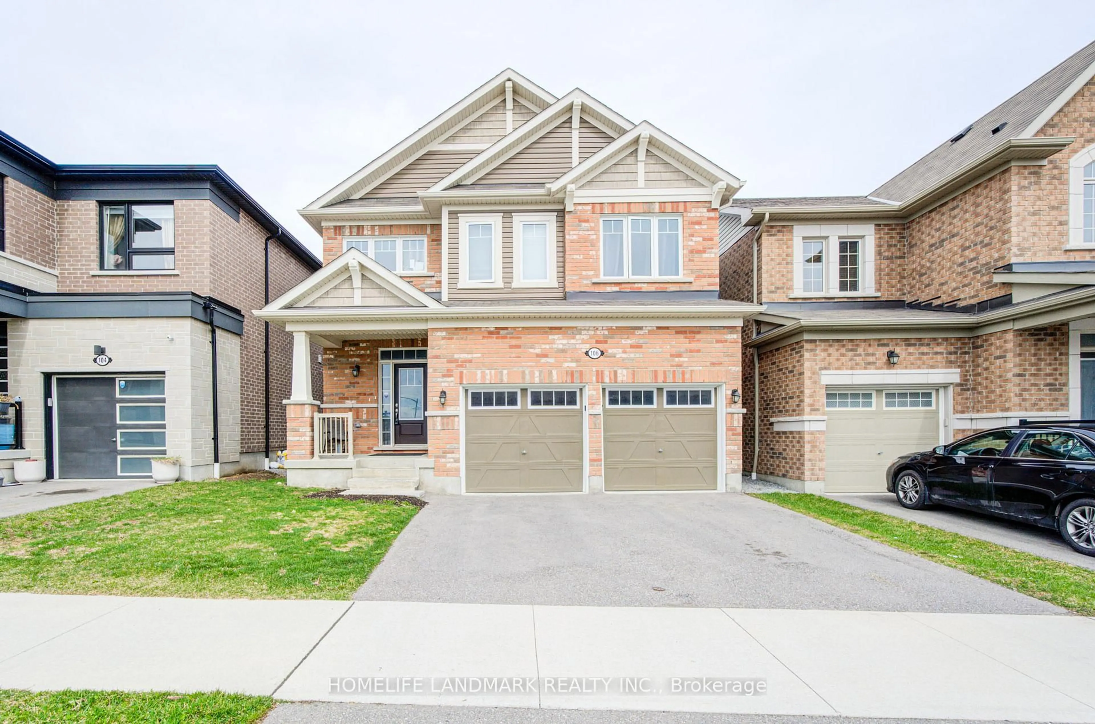 Home with brick exterior material, street for 106 Barkerville Dr, Whitby Ontario L1P 0L8