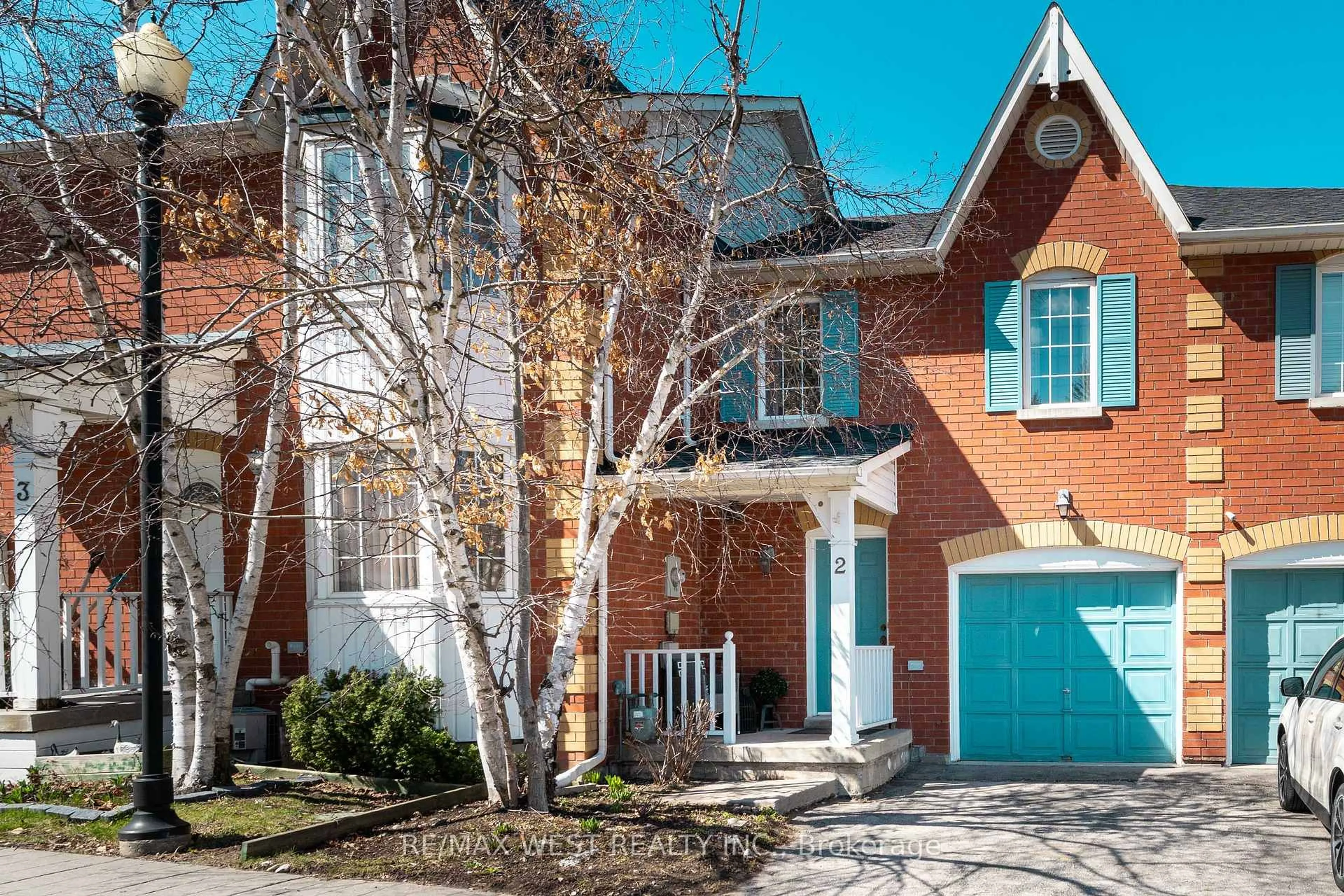 Home with brick exterior material, street for 50 Markham Rd #2, Toronto Ontario M1M 2Z4