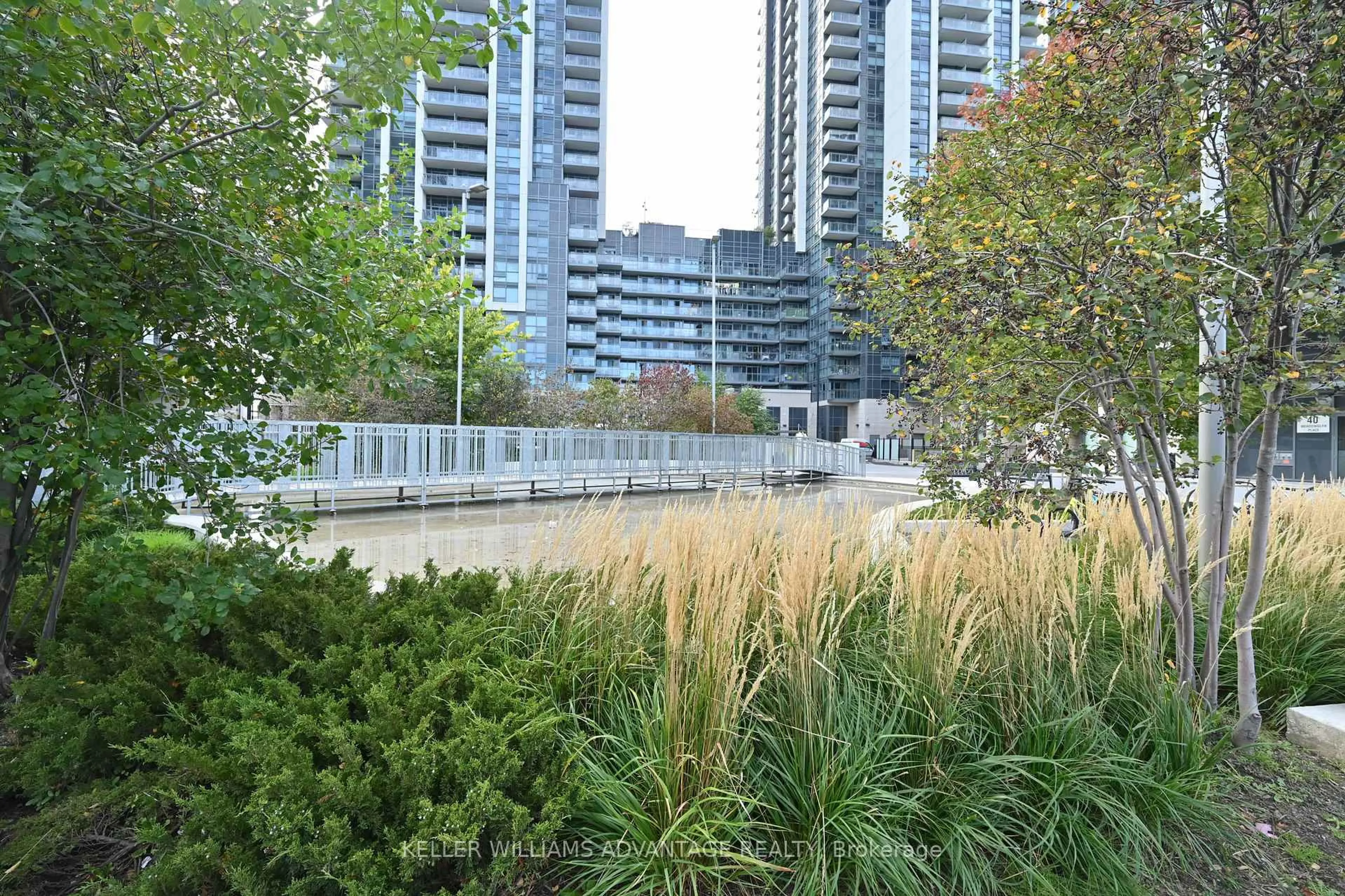Patio, city buildings view from balcony for 20 Meadowglen Pl #728, Toronto Ontario M1G 0A9