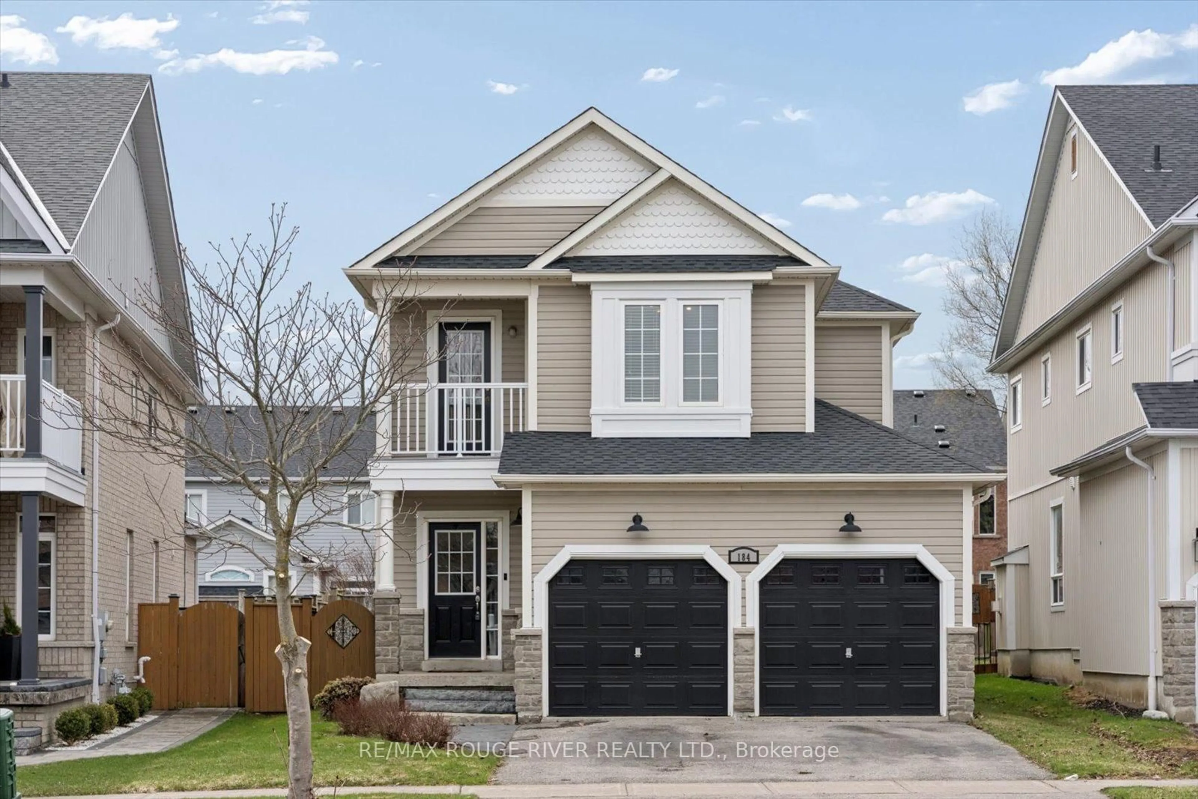 Home with vinyl exterior material, street for 184 Cachet Blvd, Whitby Ontario L1M 2L9