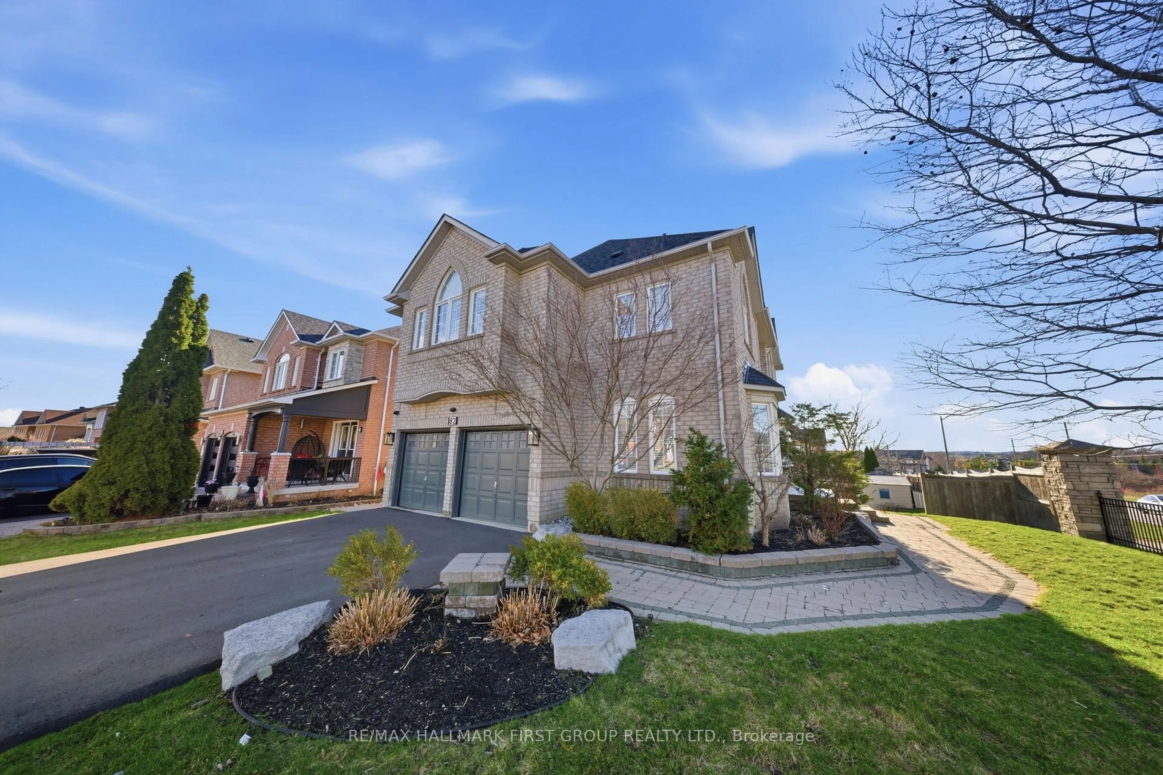 Home with brick exterior material, street for 82 Woodcock Ave, Ajax Ontario L1T 4L7