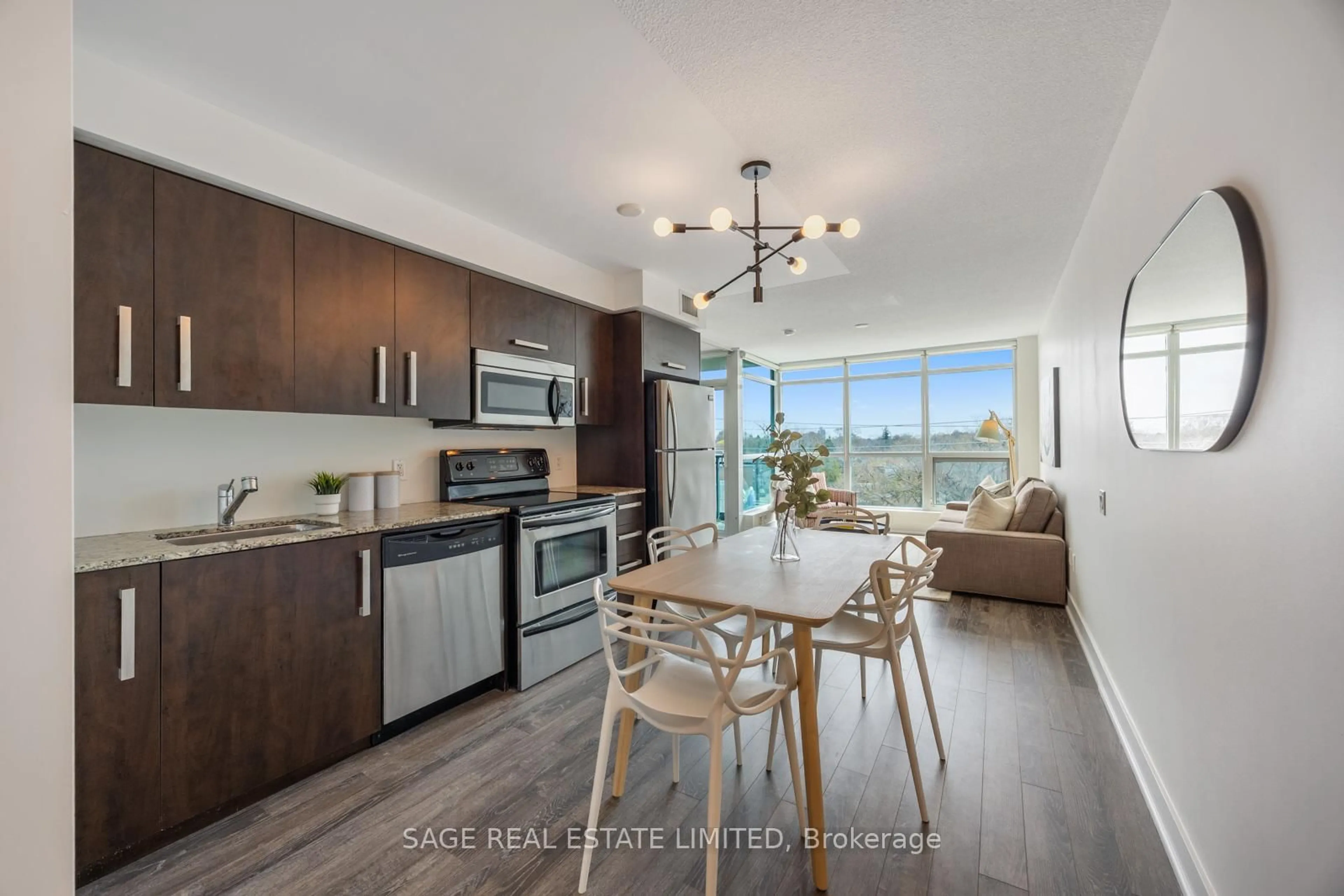 Open concept kitchen, wood/laminate floor for 1048 Broadview Ave #506, Toronto Ontario M4K 2B8