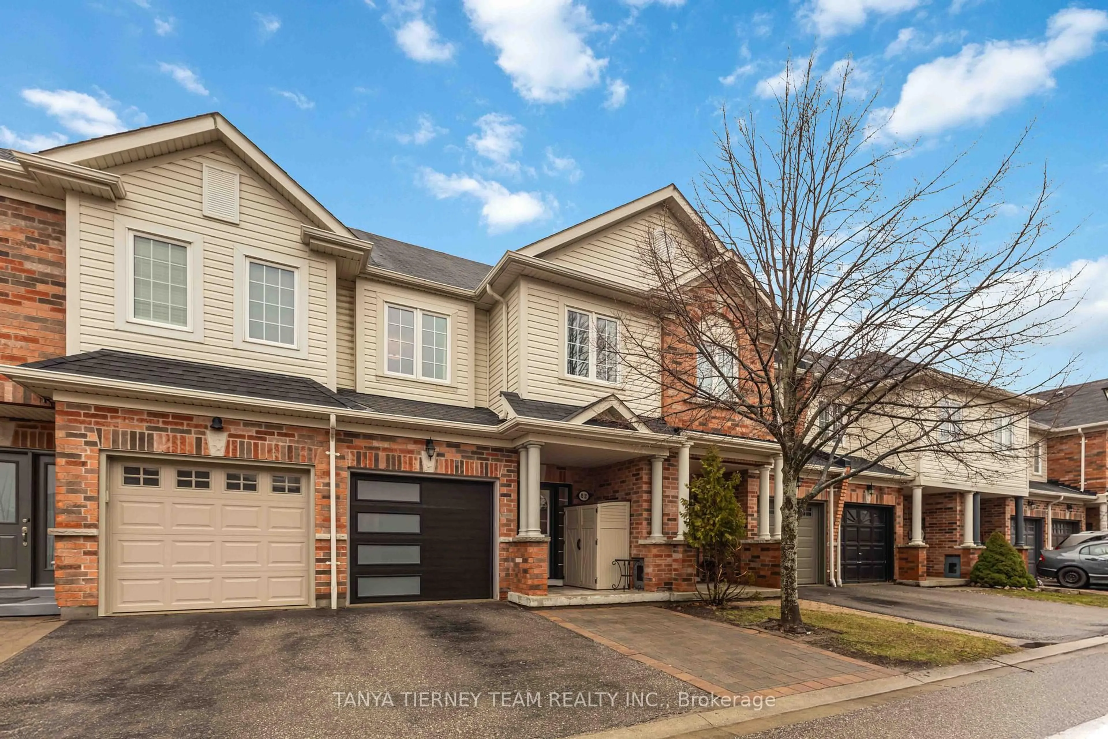 Home with brick exterior material, street for 82 Tempo Way, Whitby Ontario L1M 0G2