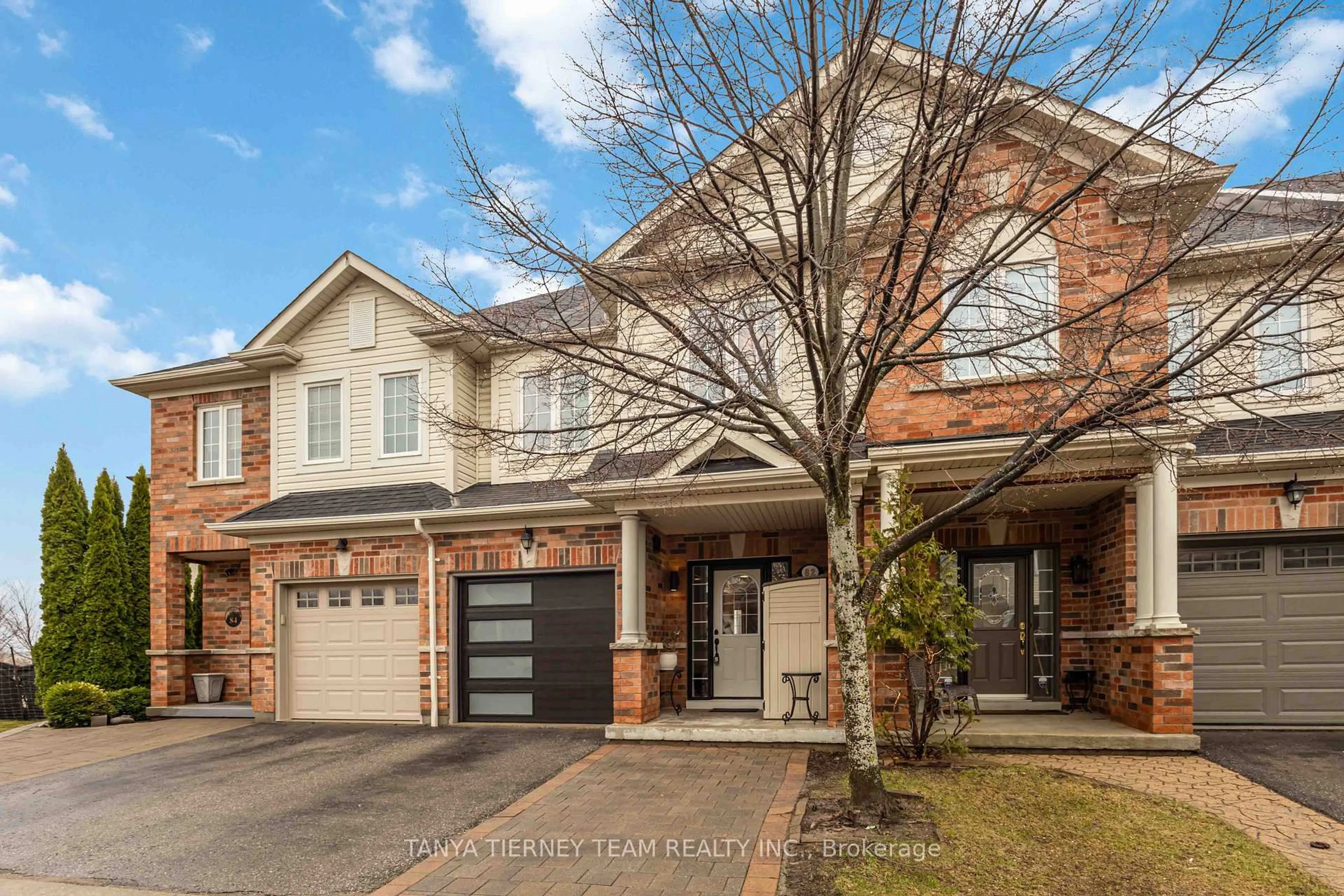 Home with brick exterior material, street for 82 Tempo Way, Whitby Ontario L1M 0G2