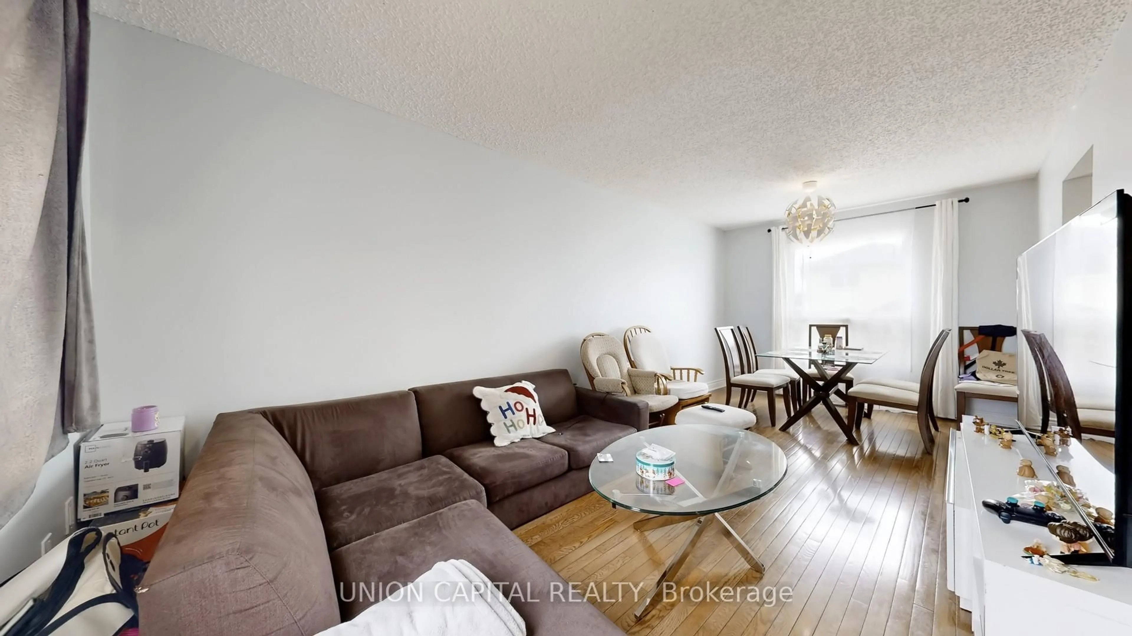 Living room with furniture, wood/laminate floor for 142 Wright Cres, Ajax Ontario L1S 6X6