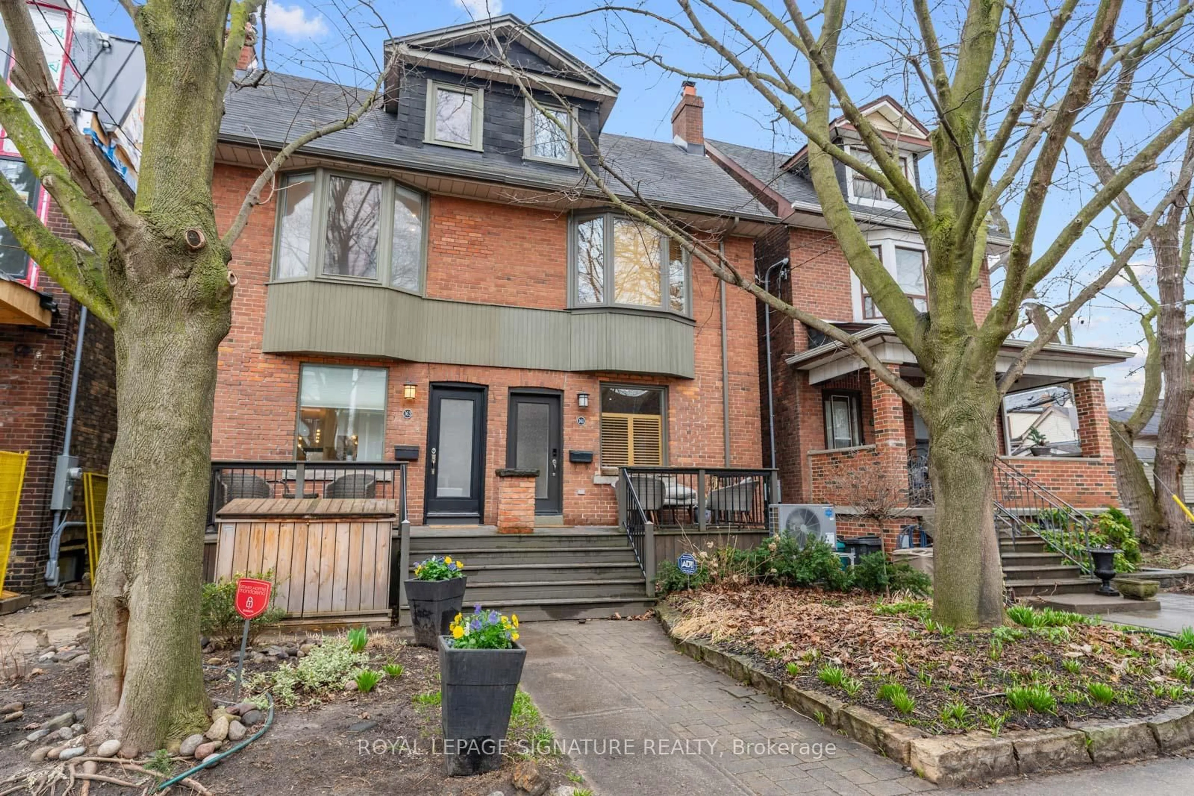 Home with brick exterior material, street for 163 Langley Ave, Toronto Ontario M4K 1B8