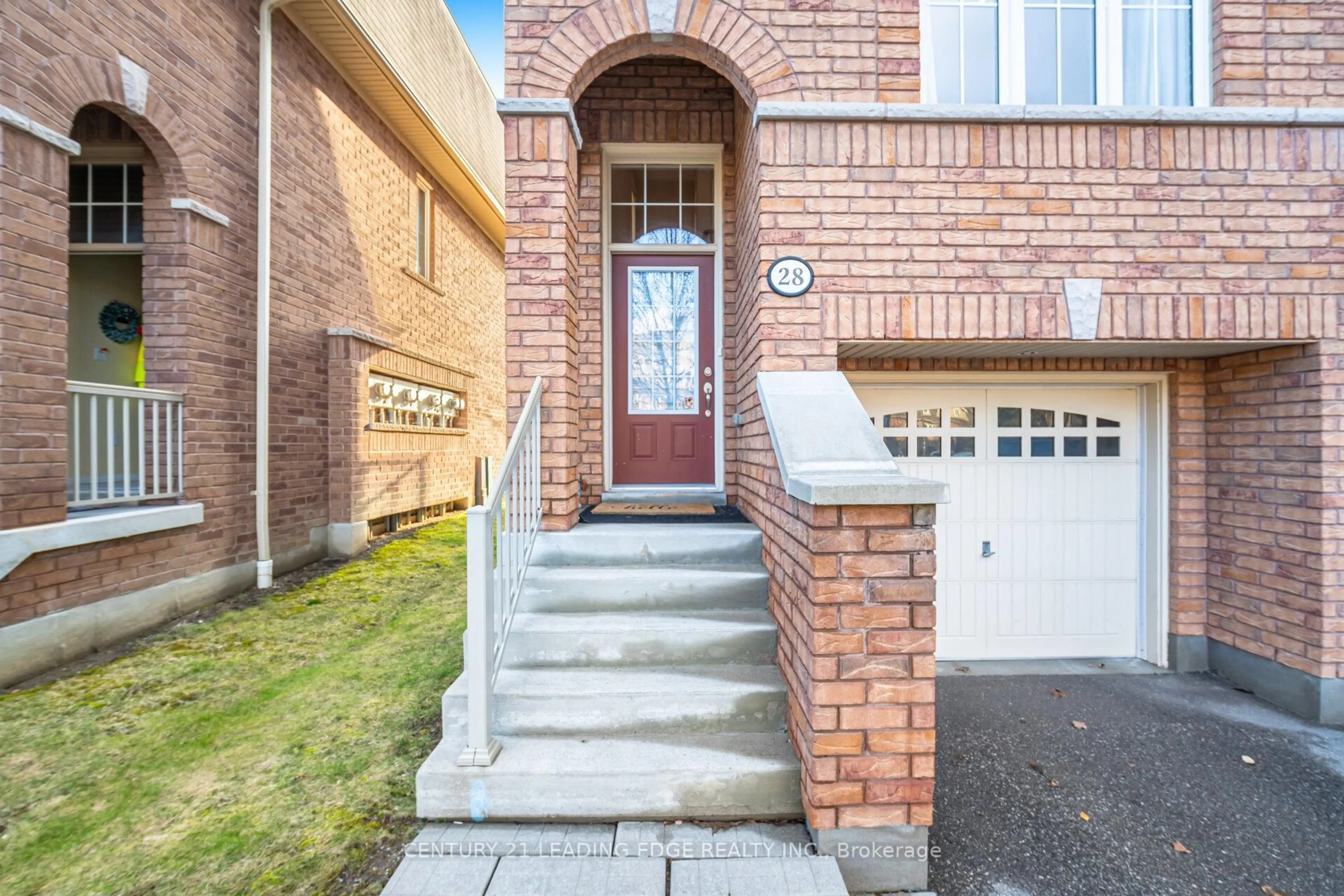 Home with brick exterior material, street for 28 Burtonbury Lane, Ajax Ontario L1Z 0C9