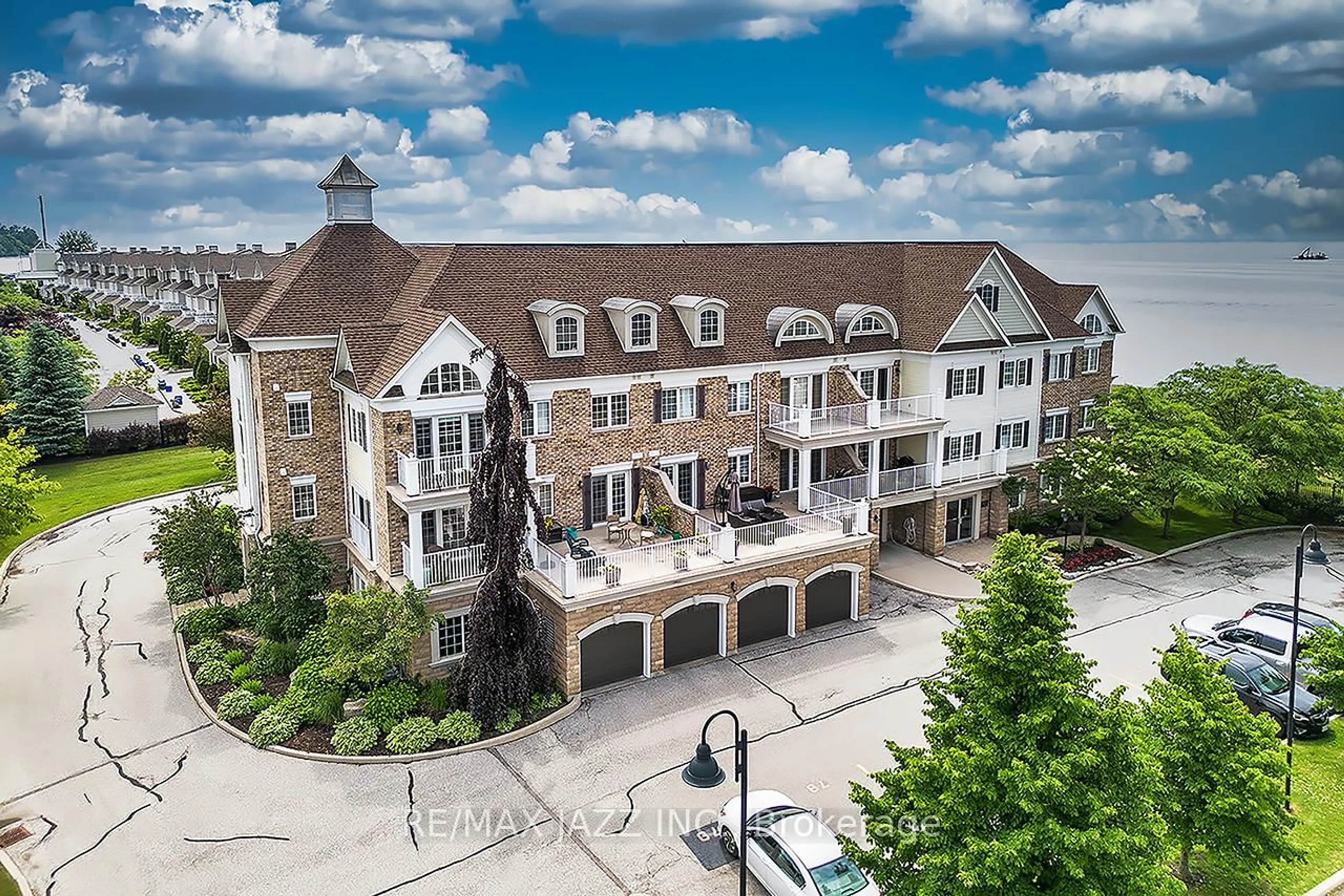 A pic from outside/outdoor area/front of a property/back of a property/a pic from drone, unknown for 375 Lakebreeze Dr #102, Clarington Ontario L1B 0A3