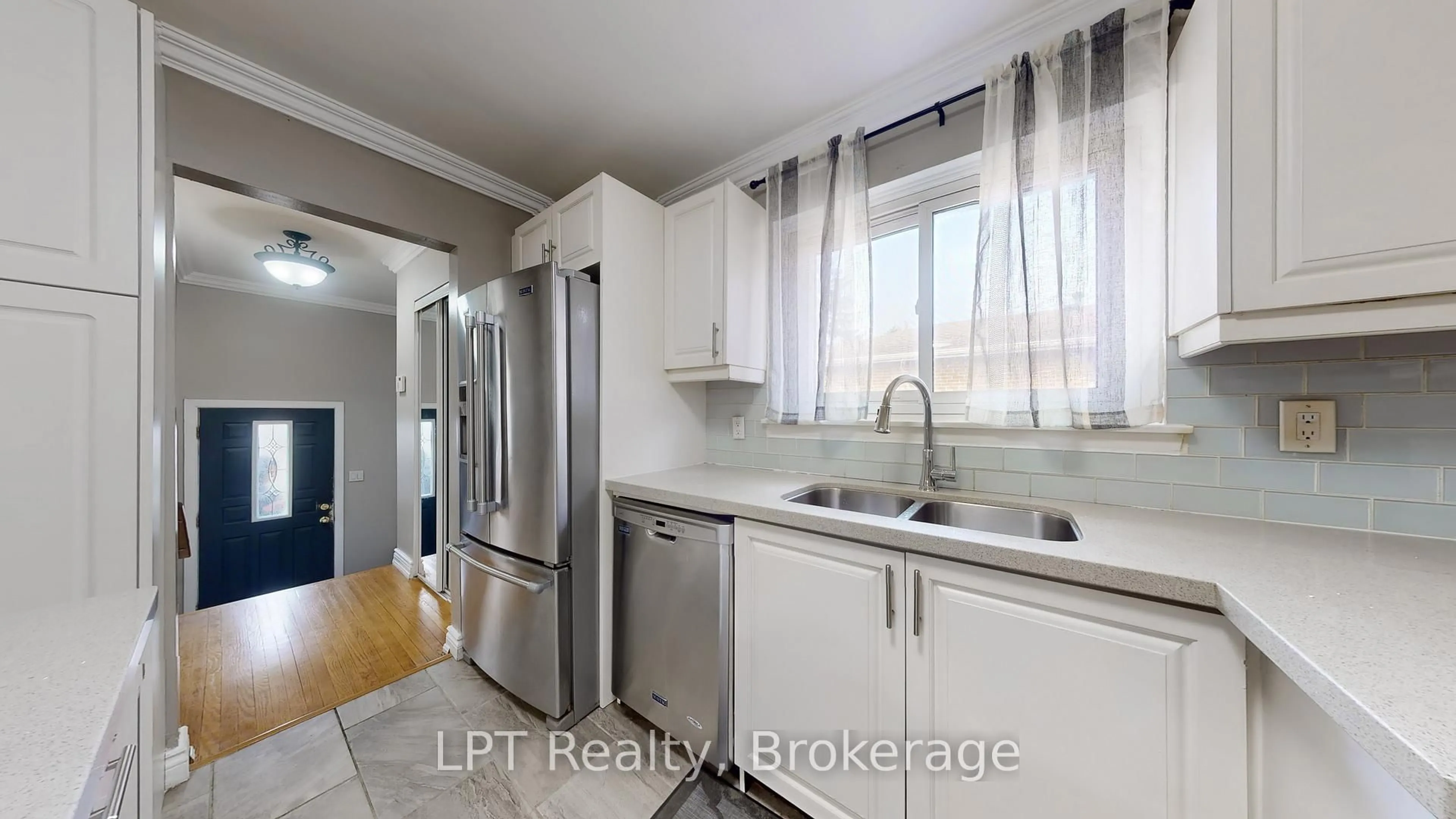 Kitchen with laundary machines, unknown for 23 Gorsey Sq, Toronto Ontario M1B 1A6