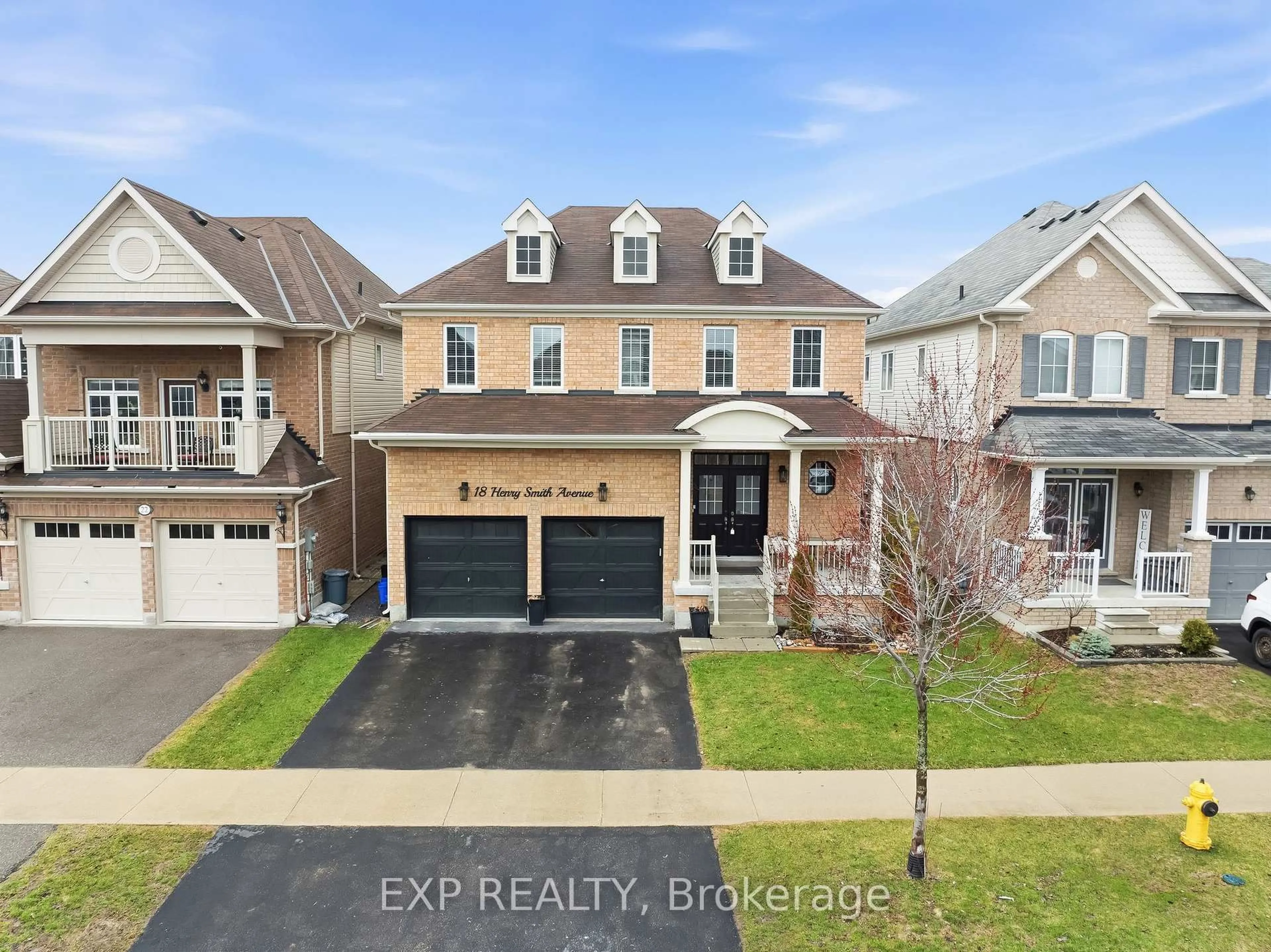 A pic from outside/outdoor area/front of a property/back of a property/a pic from drone, street for 18 Henry Smith Ave, Clarington Ontario L1C 0W2