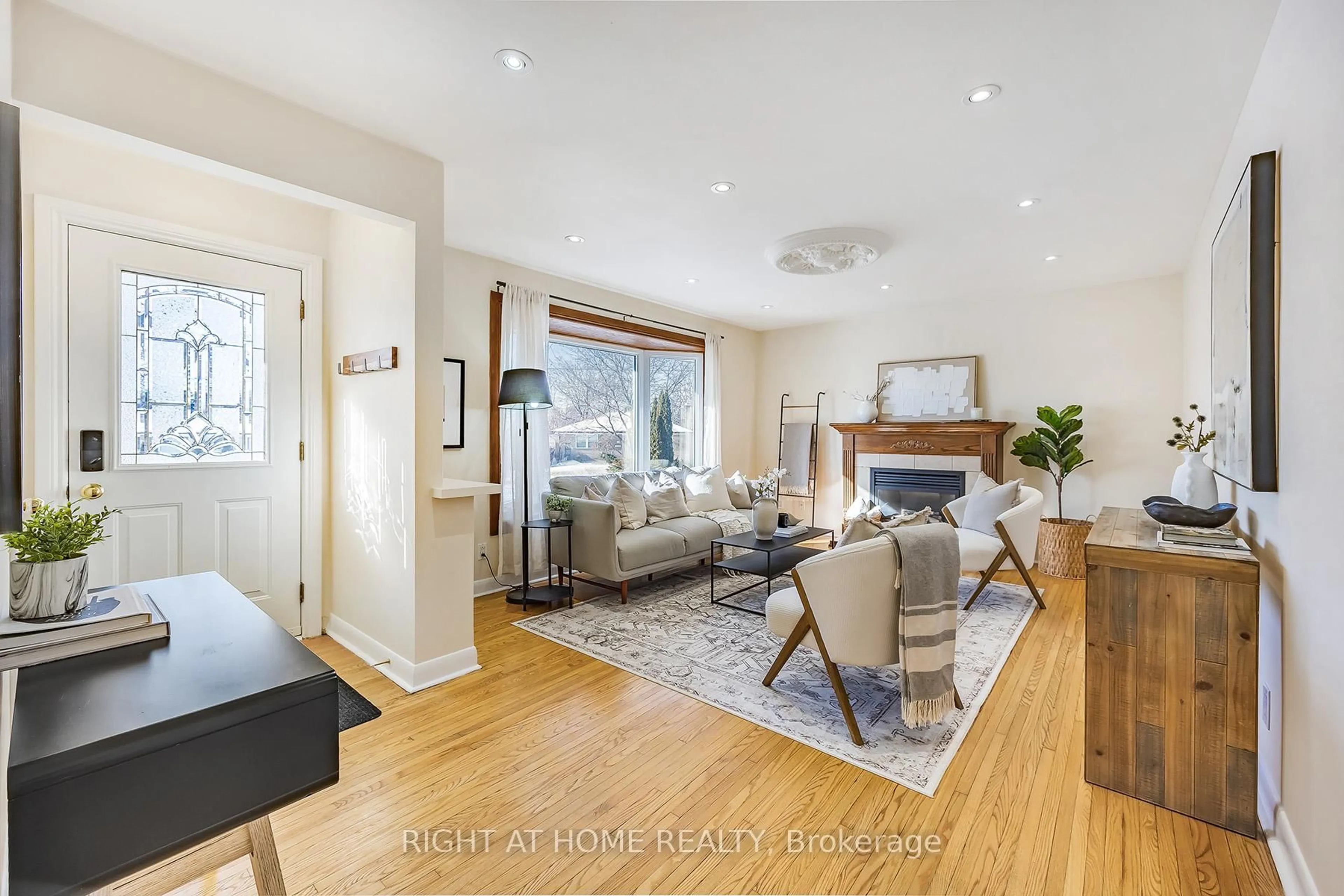 Living room with furniture, wood/laminate floor for 25 Hiley Ave, Ajax Ontario L1S 6H3