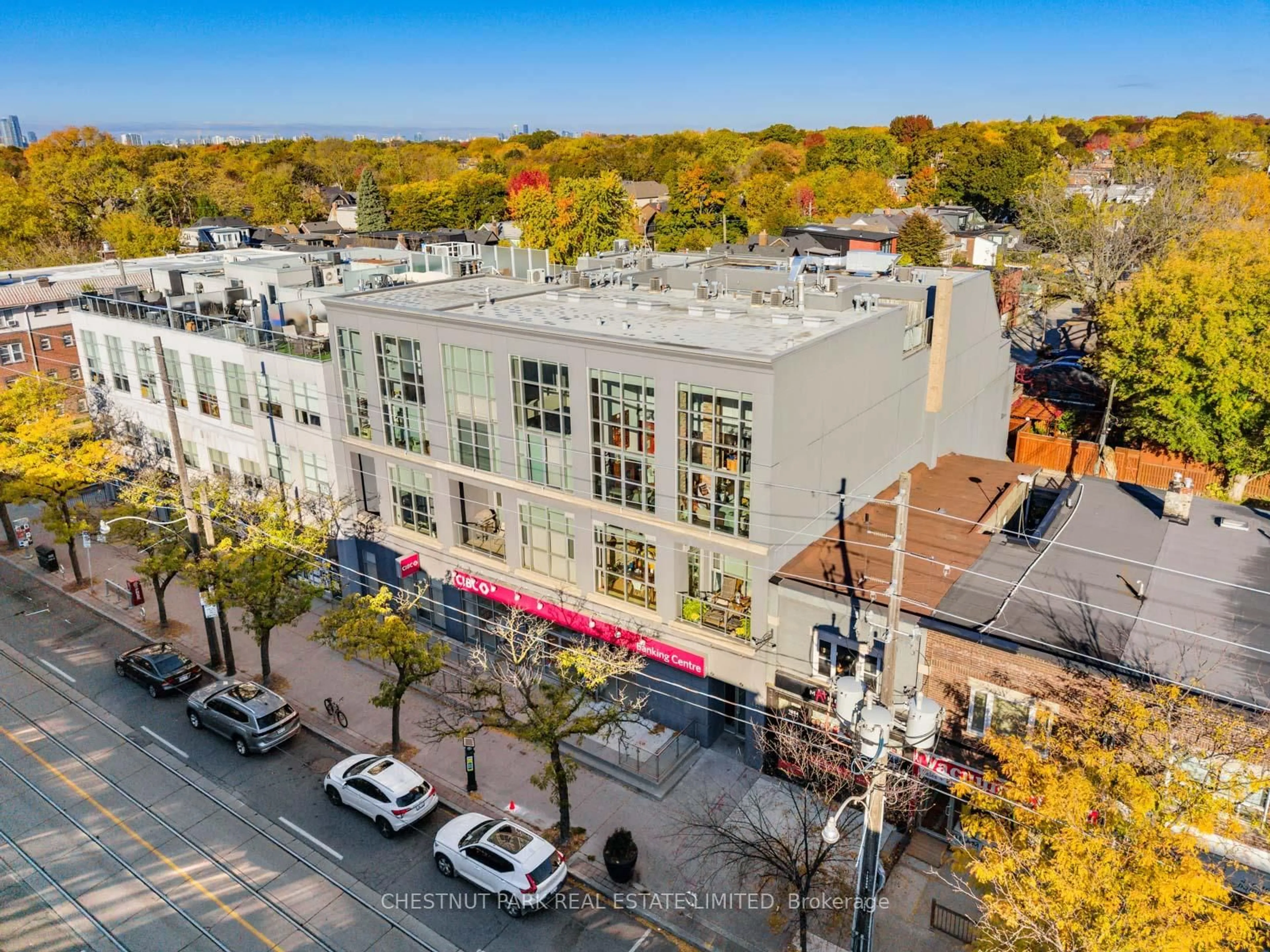 A pic from outside/outdoor area/front of a property/back of a property/a pic from drone, city buildings view from balcony for 1852 Queen St #304, Toronto Ontario M4L 1H1